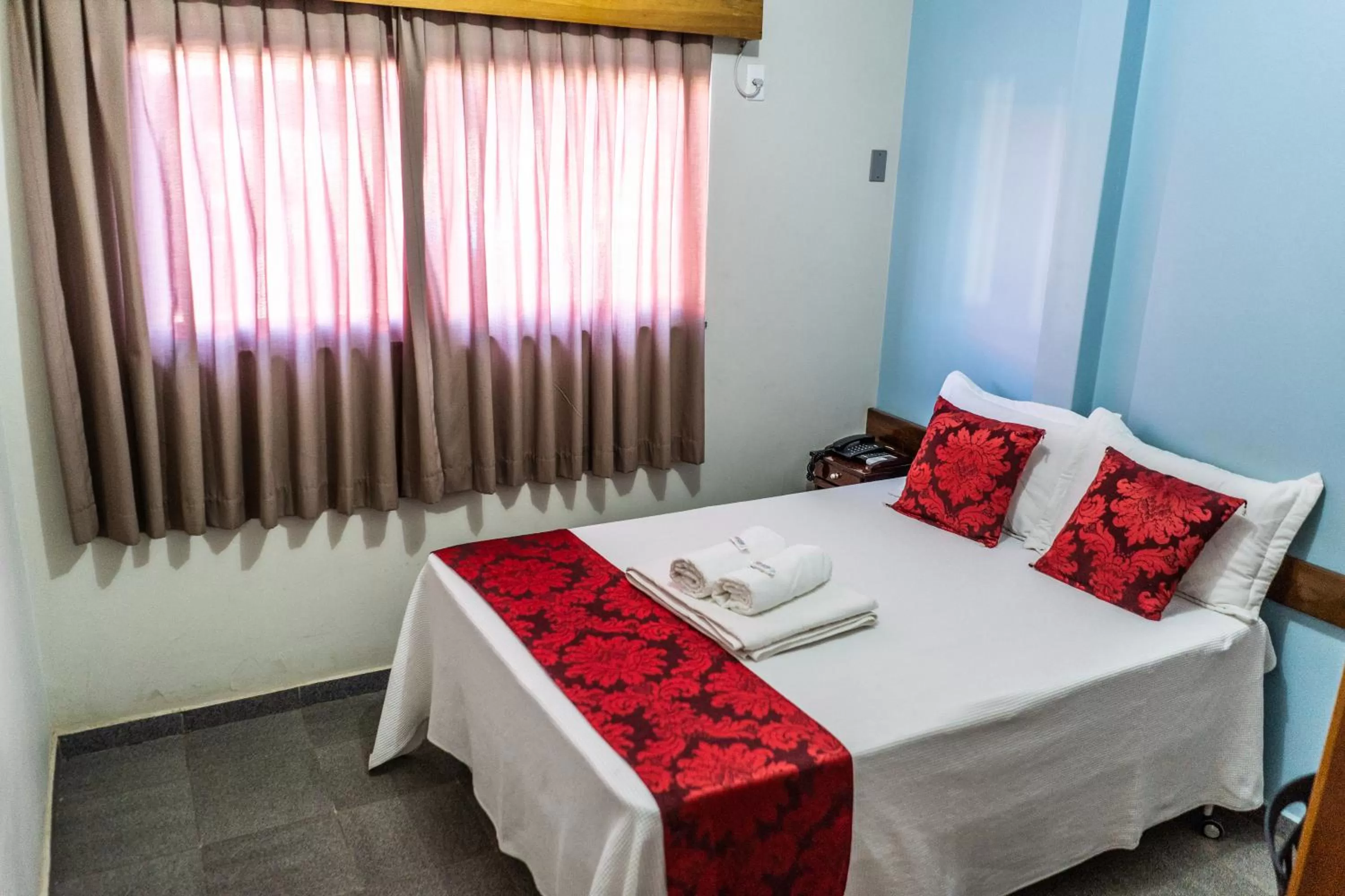 Bed in Pousada Paraiso