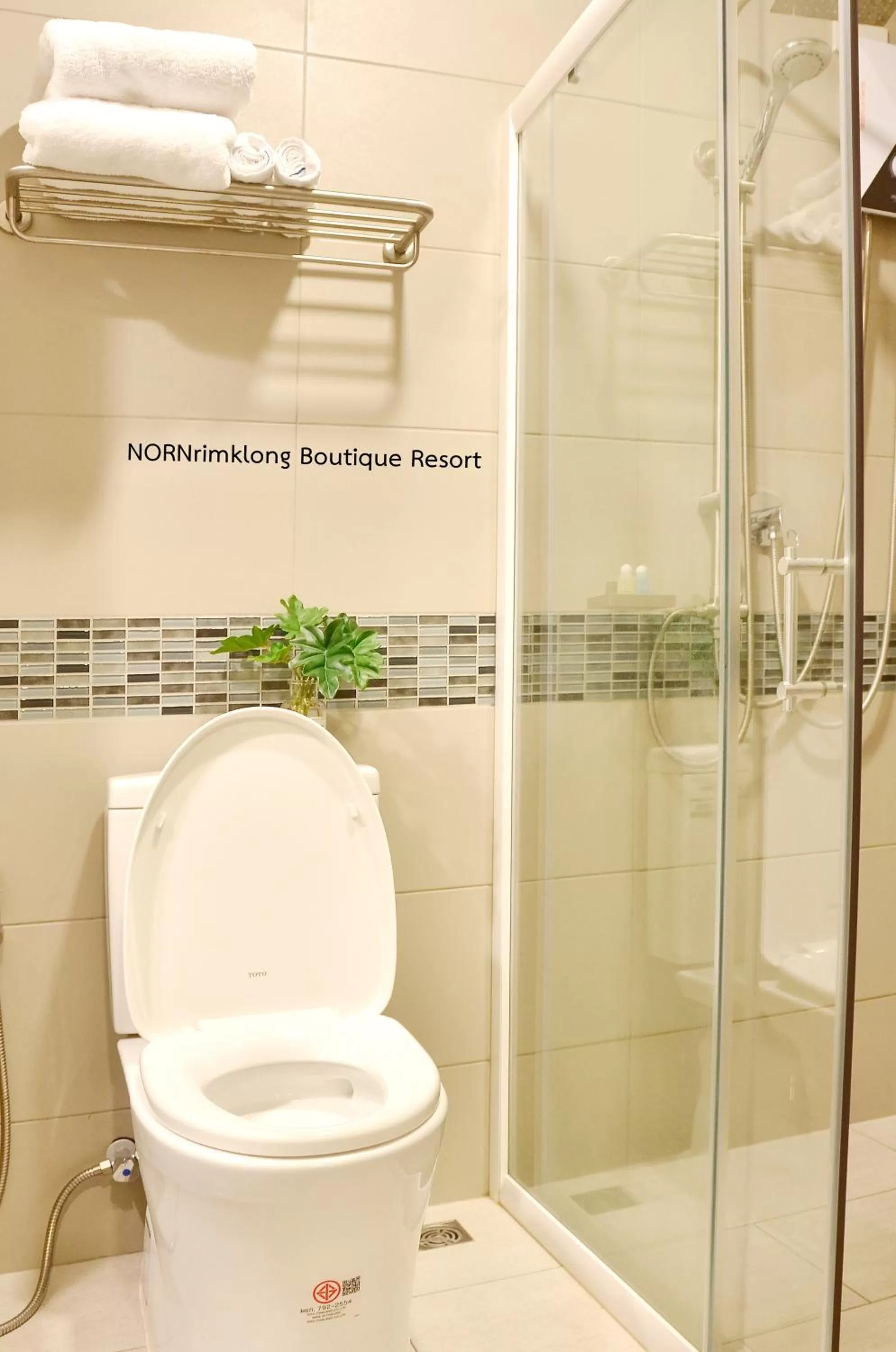 Shower in NORN Rimklong Bangkok Hotel