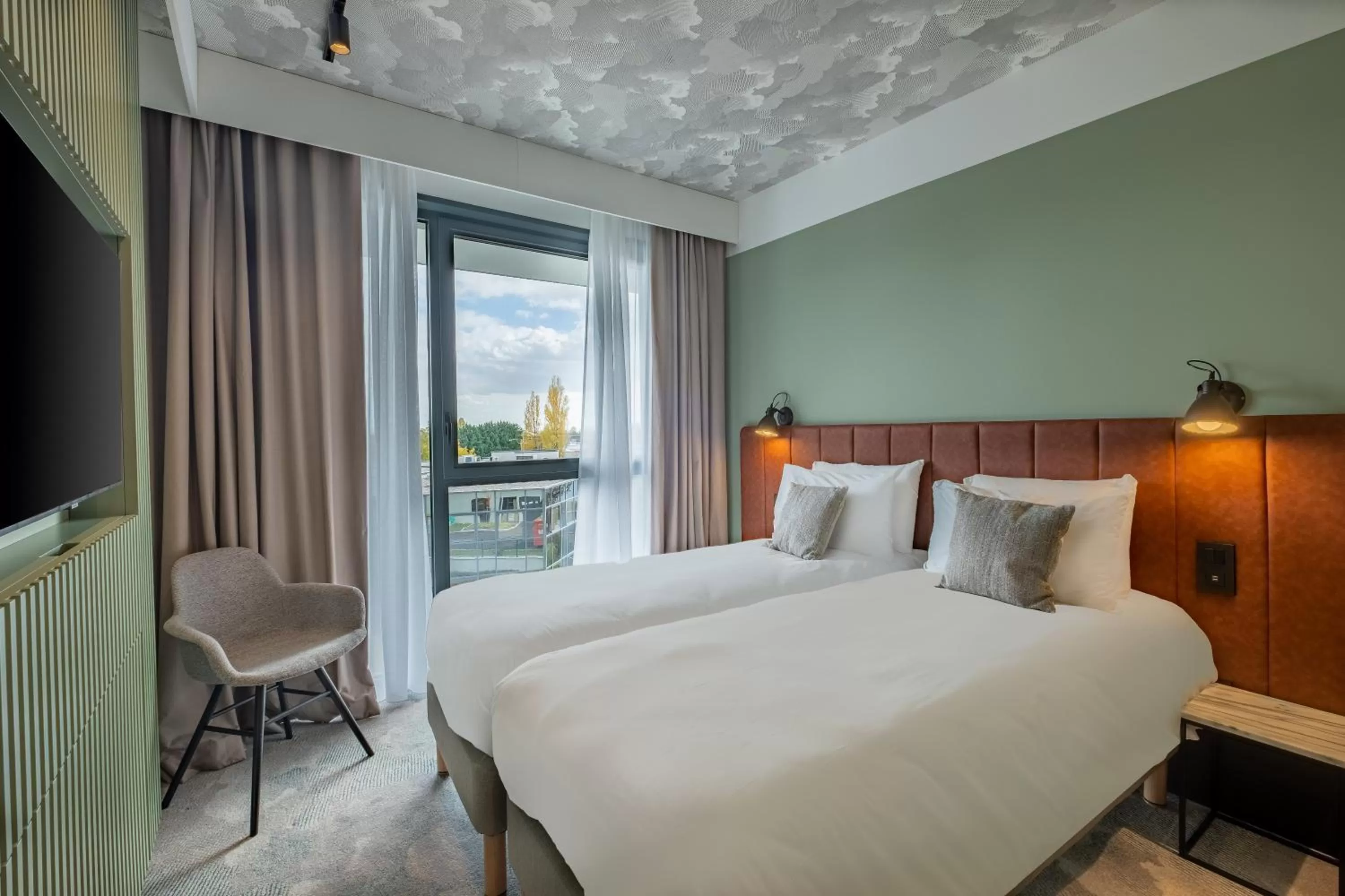 Bed in KYRIAD LYON OUEST Limonest