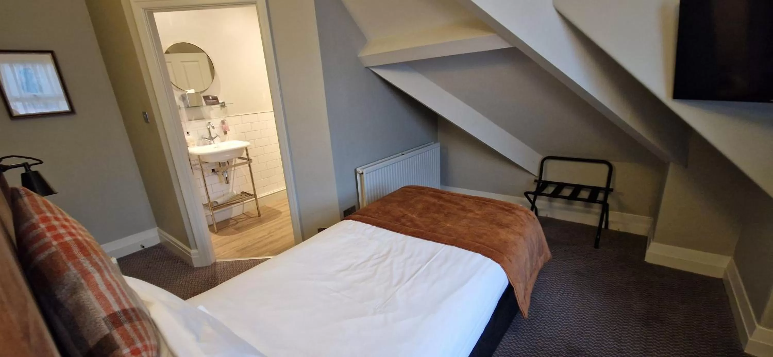 Bed in The Cross-Keys Hotel