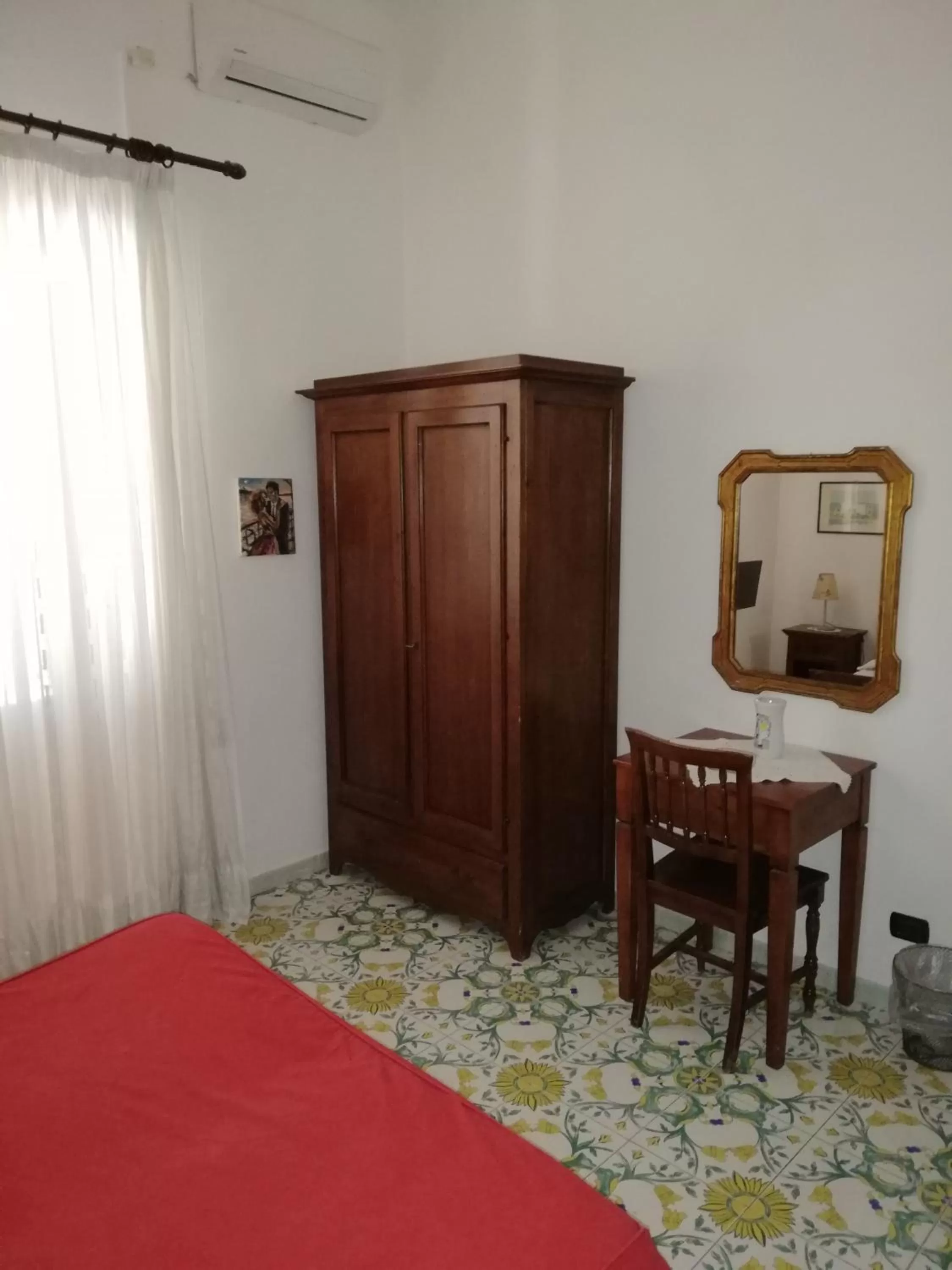 Decorative detail, Bed in Hotel Sibilla Residence