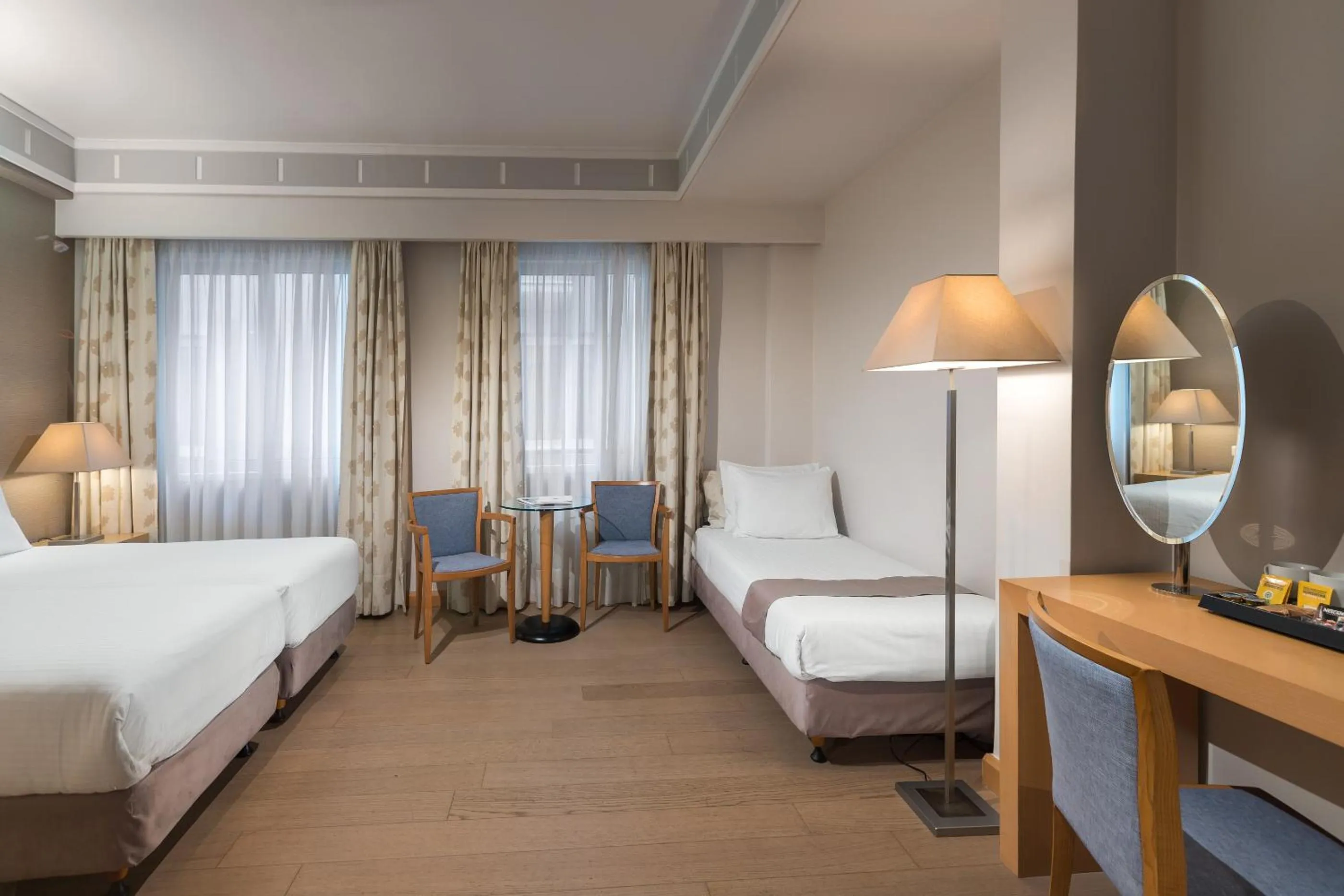 Photo of the whole room, Bed in Central Hotel