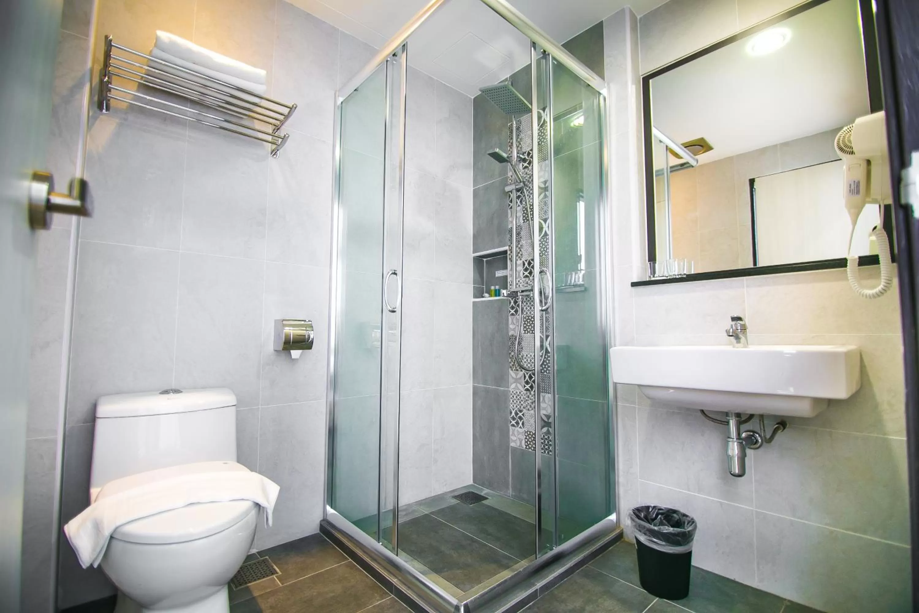 Shower in INDRA HOTEL - BOUTIQUE SUITES