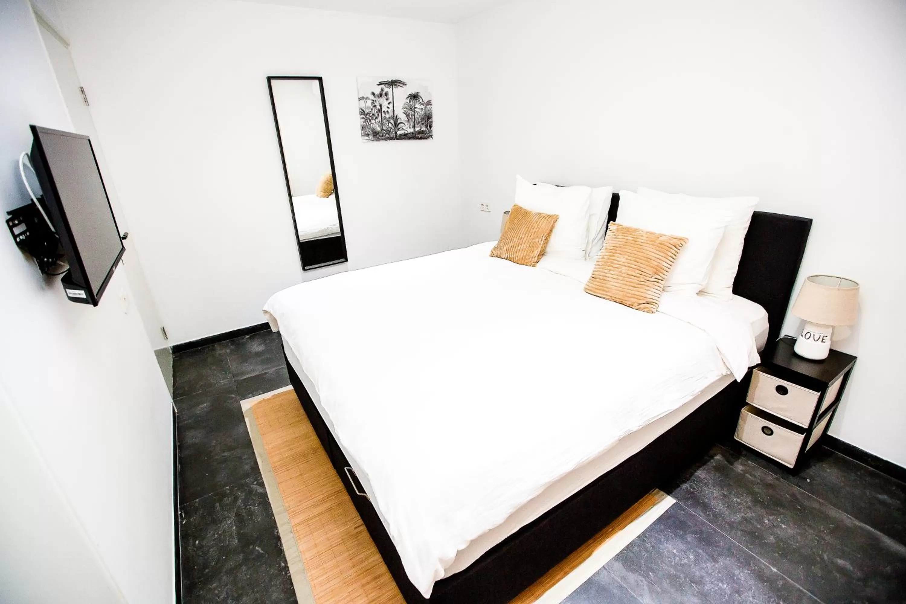 Bed in Bronbella Villa Residence