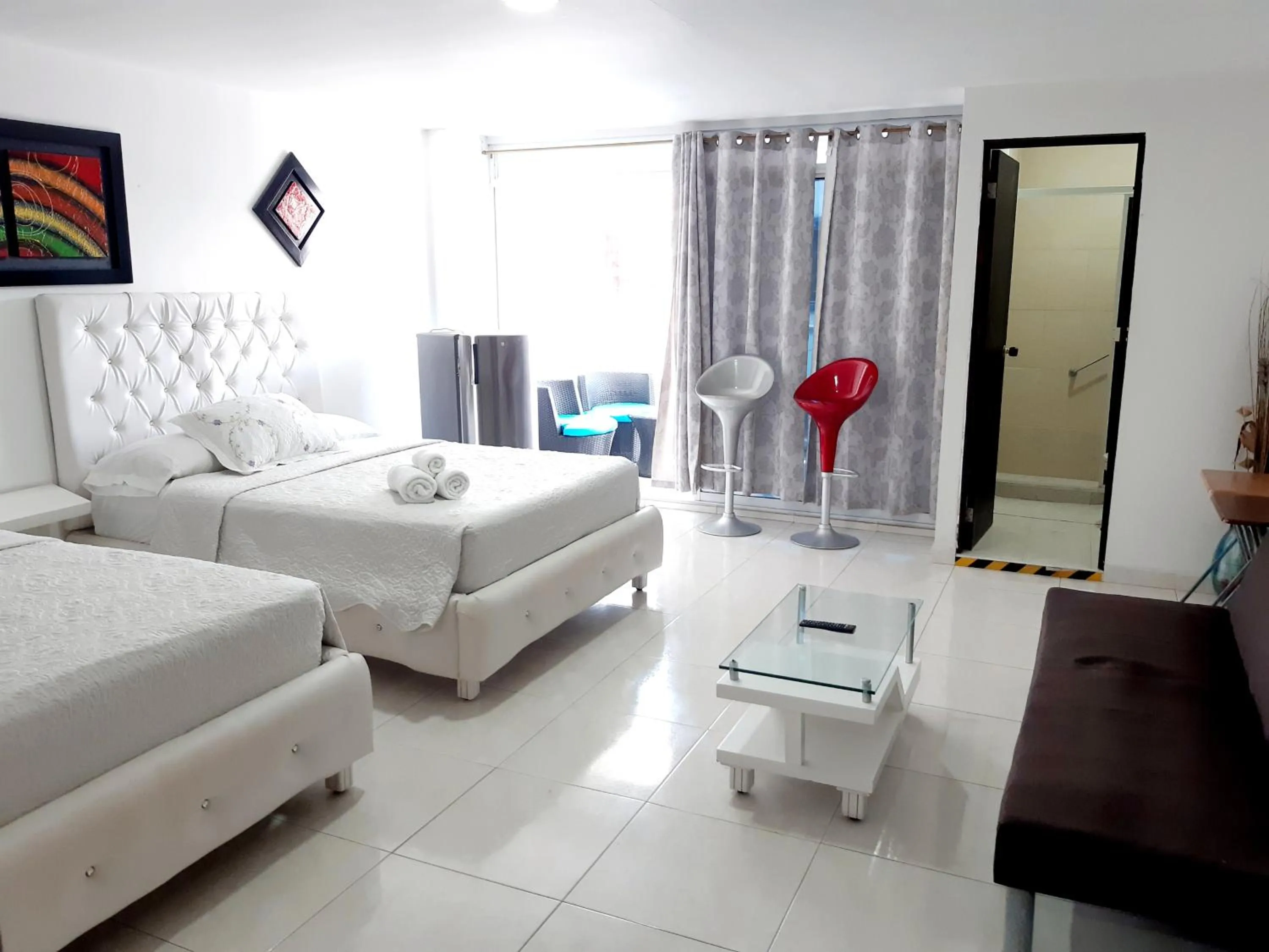 Photo of the whole room, Bed in Blue Emerald Inn