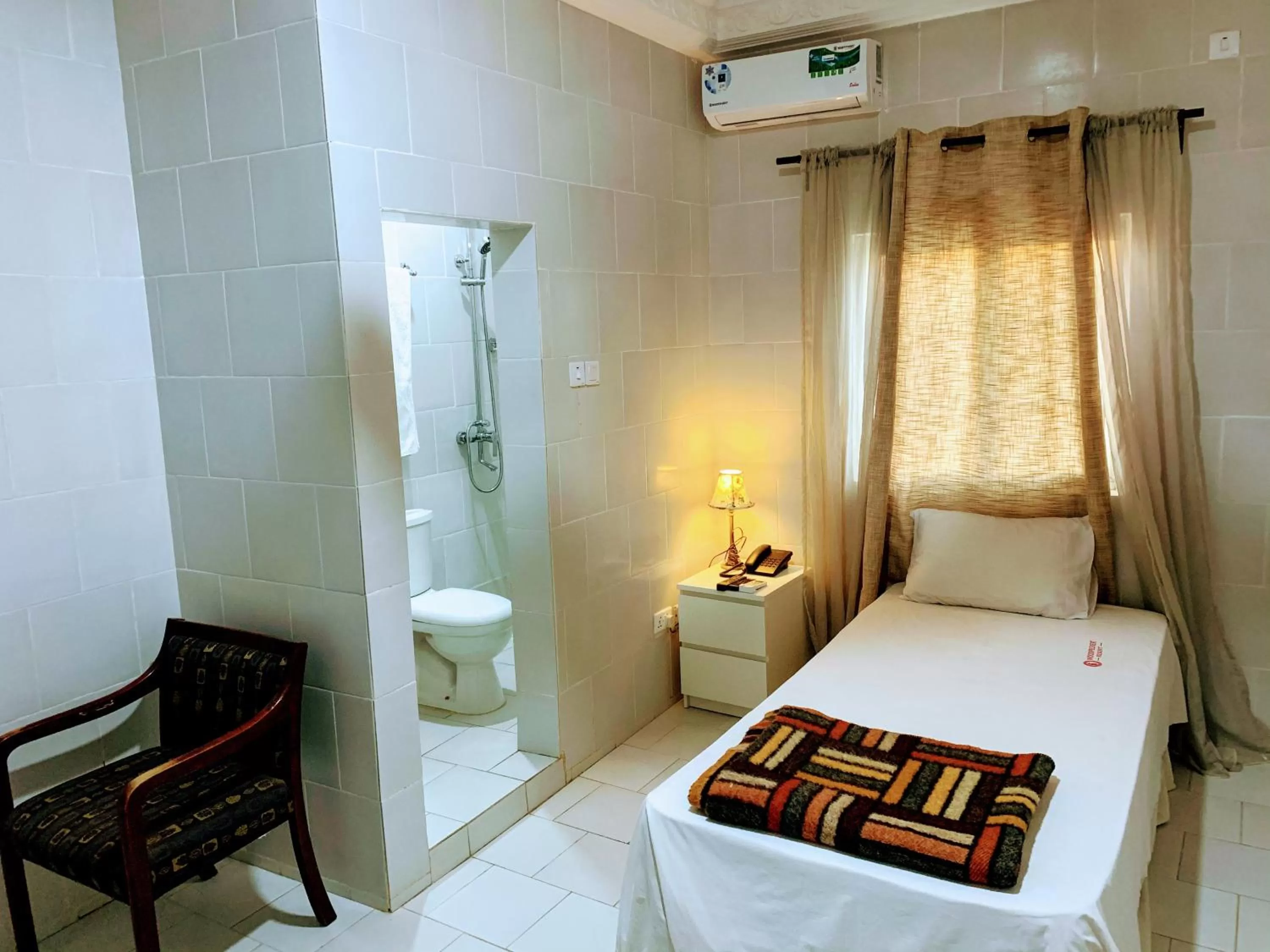 Shower, Bed in Woodpecker Resort Hotel