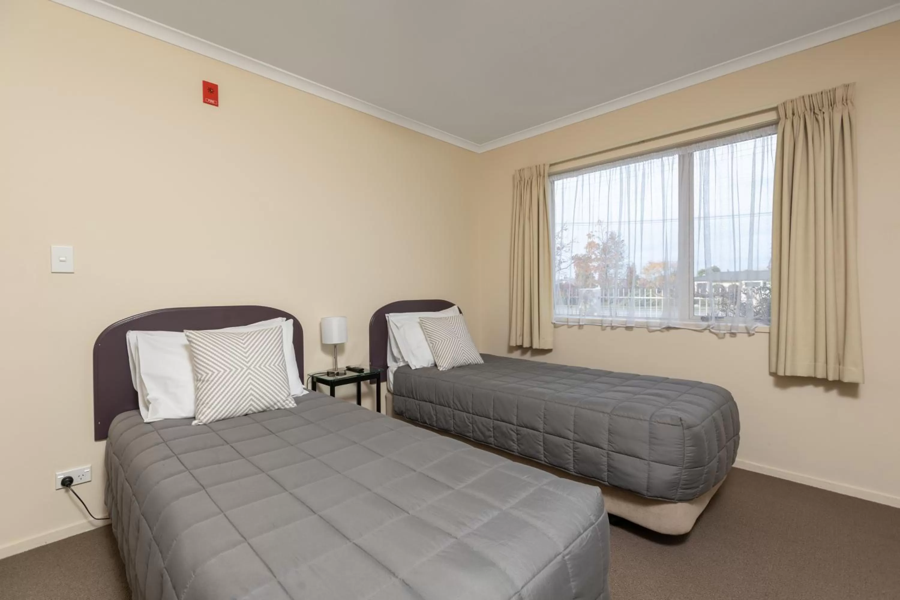 Bed in BK's Chardonnay Motor Lodge