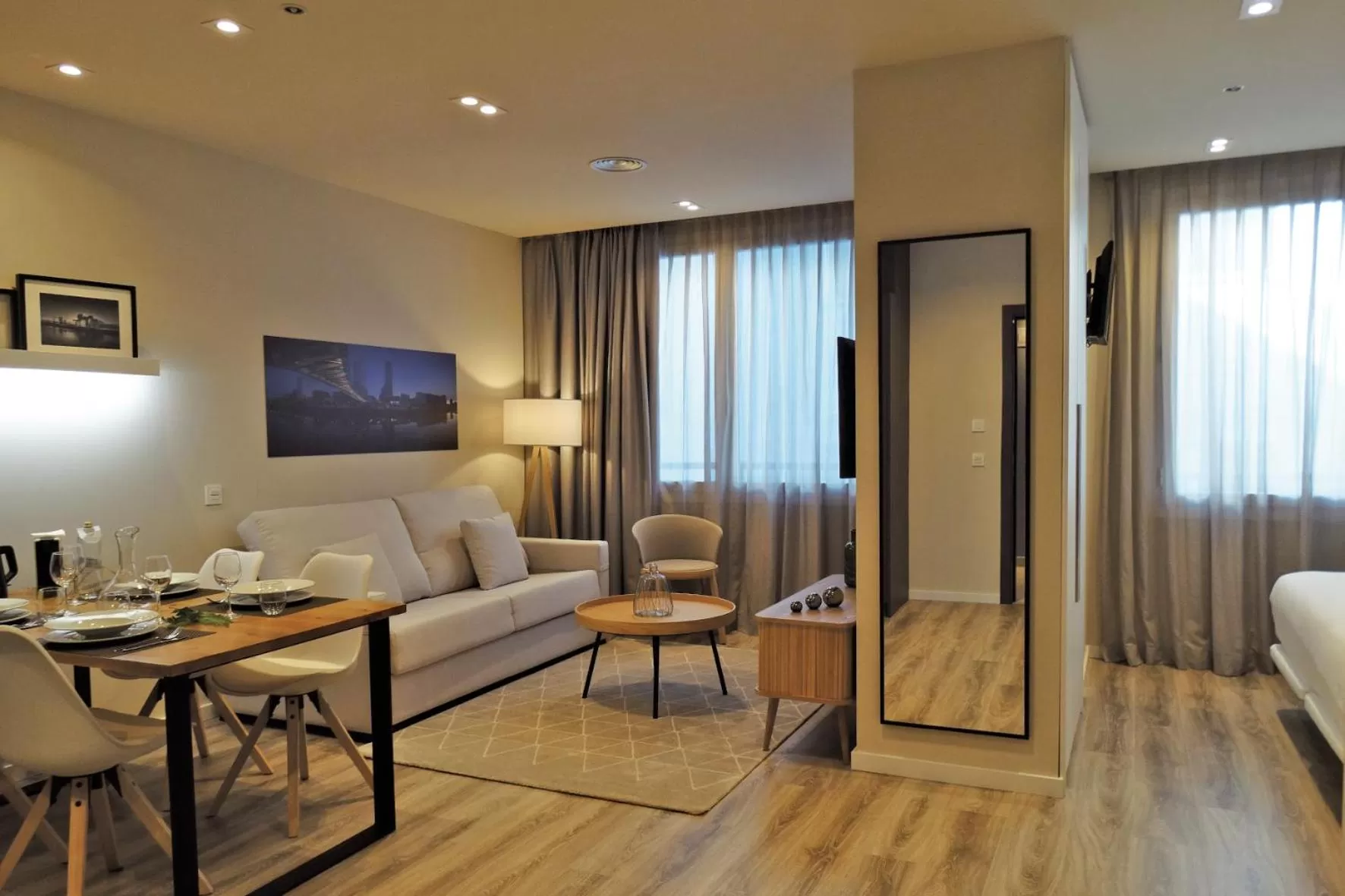 Living room, Bed in Bilbao City Center by abba Suites