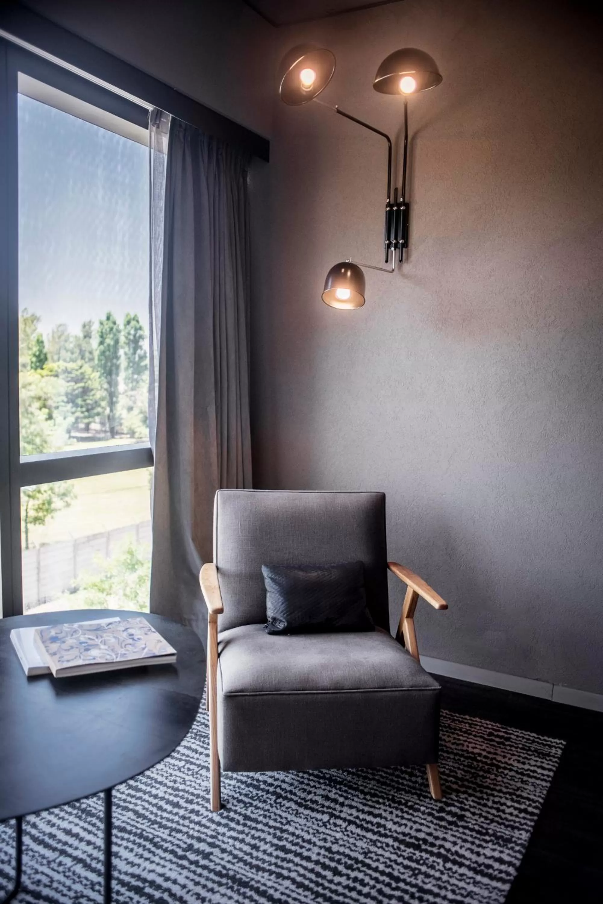 Seating area in KOS Pilar Hotel