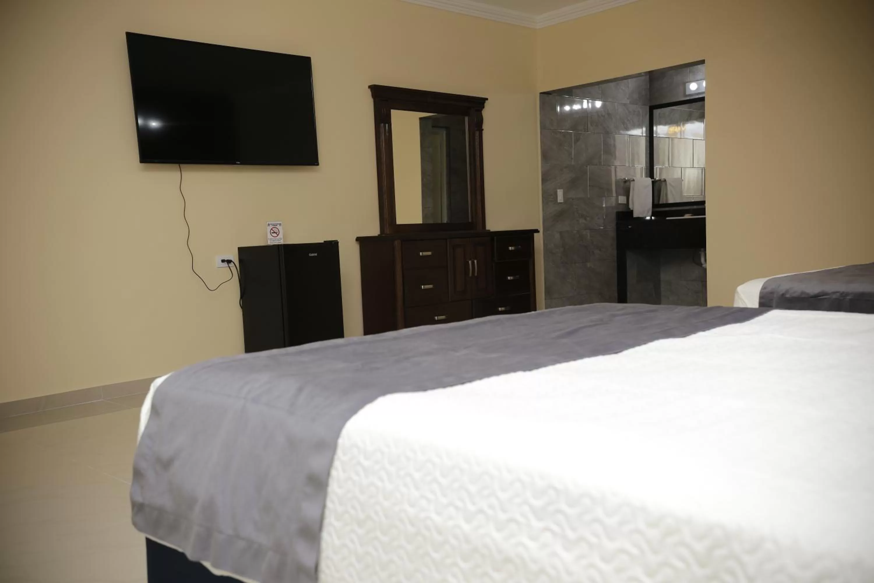 Bed in Hotel Posada Santa Fe Sabinas