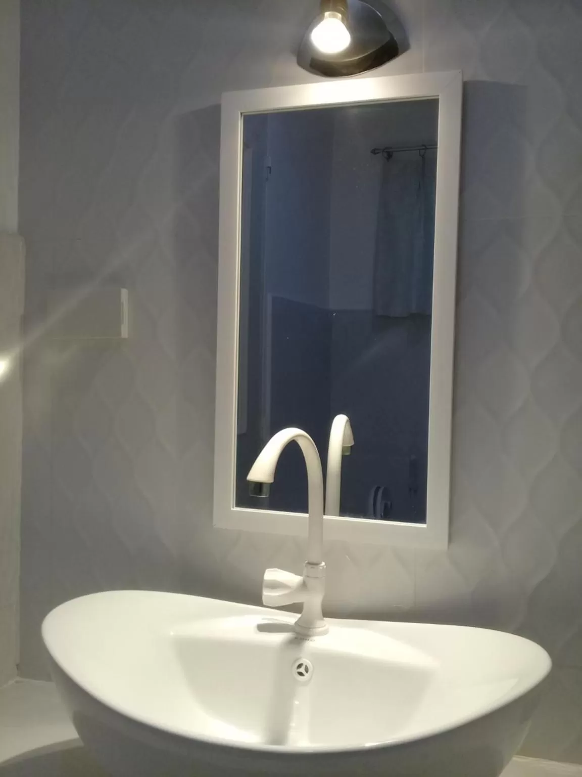 Bathroom in D & B BLUESTAR BEACH RESORT