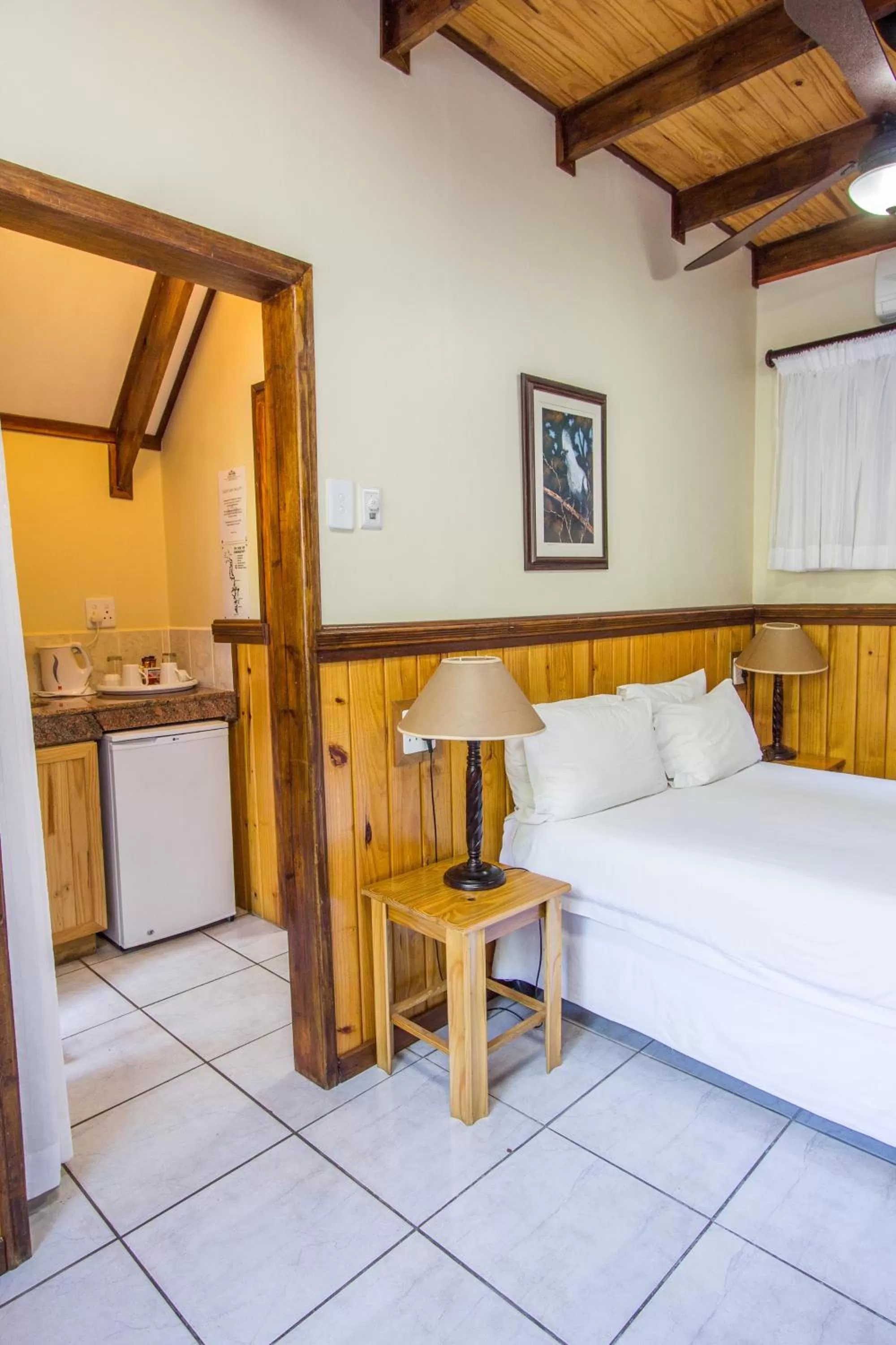 Kitchen or kitchenette, Bed in Imvubu Lodge