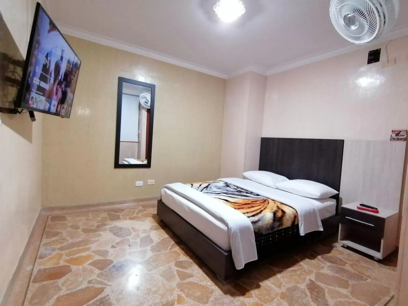 Bed in HOTEL GOLDEN SUITE