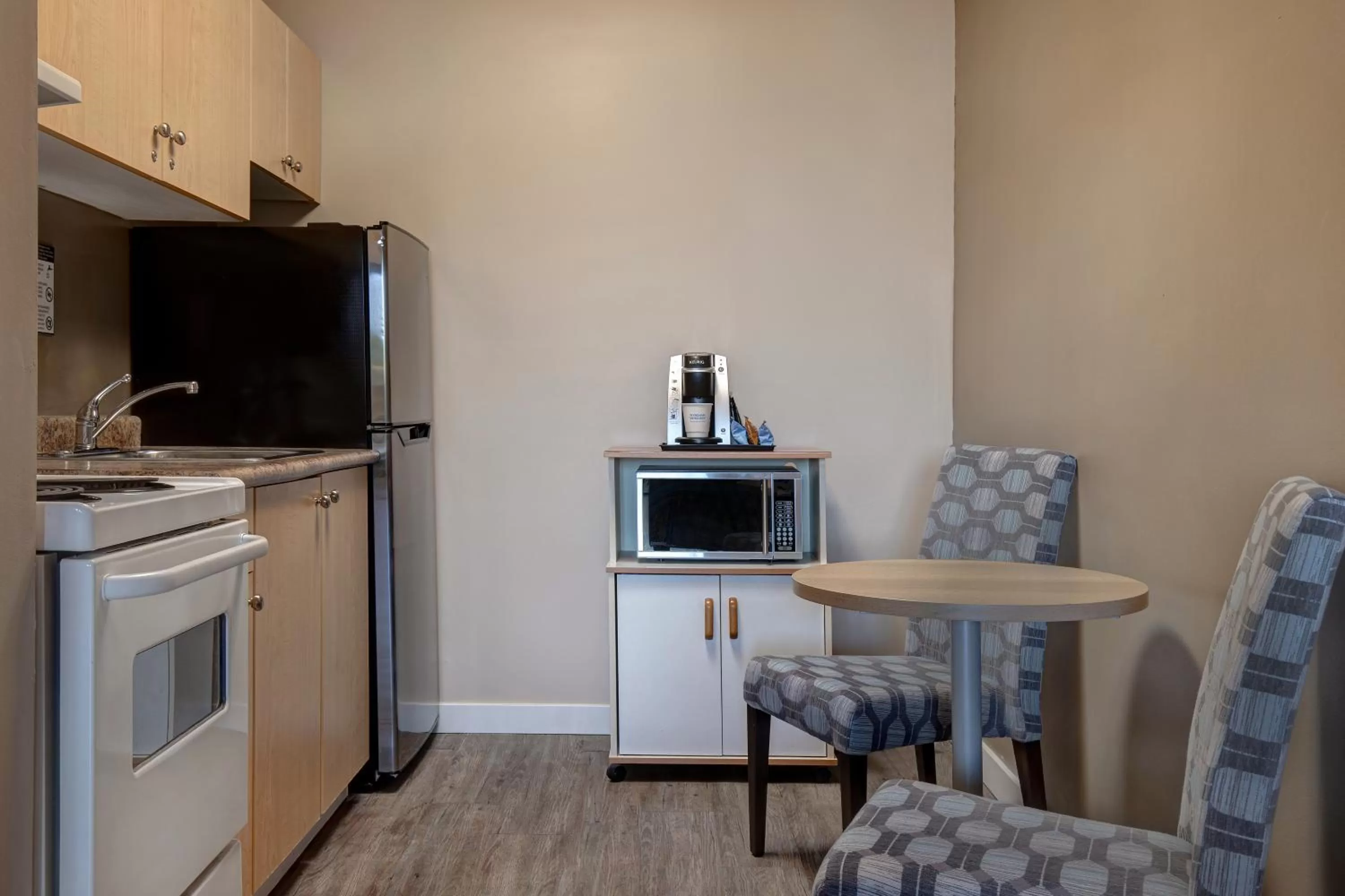 Kitchen or kitchenette in Days Inn by Wyndham Victoria Uptown