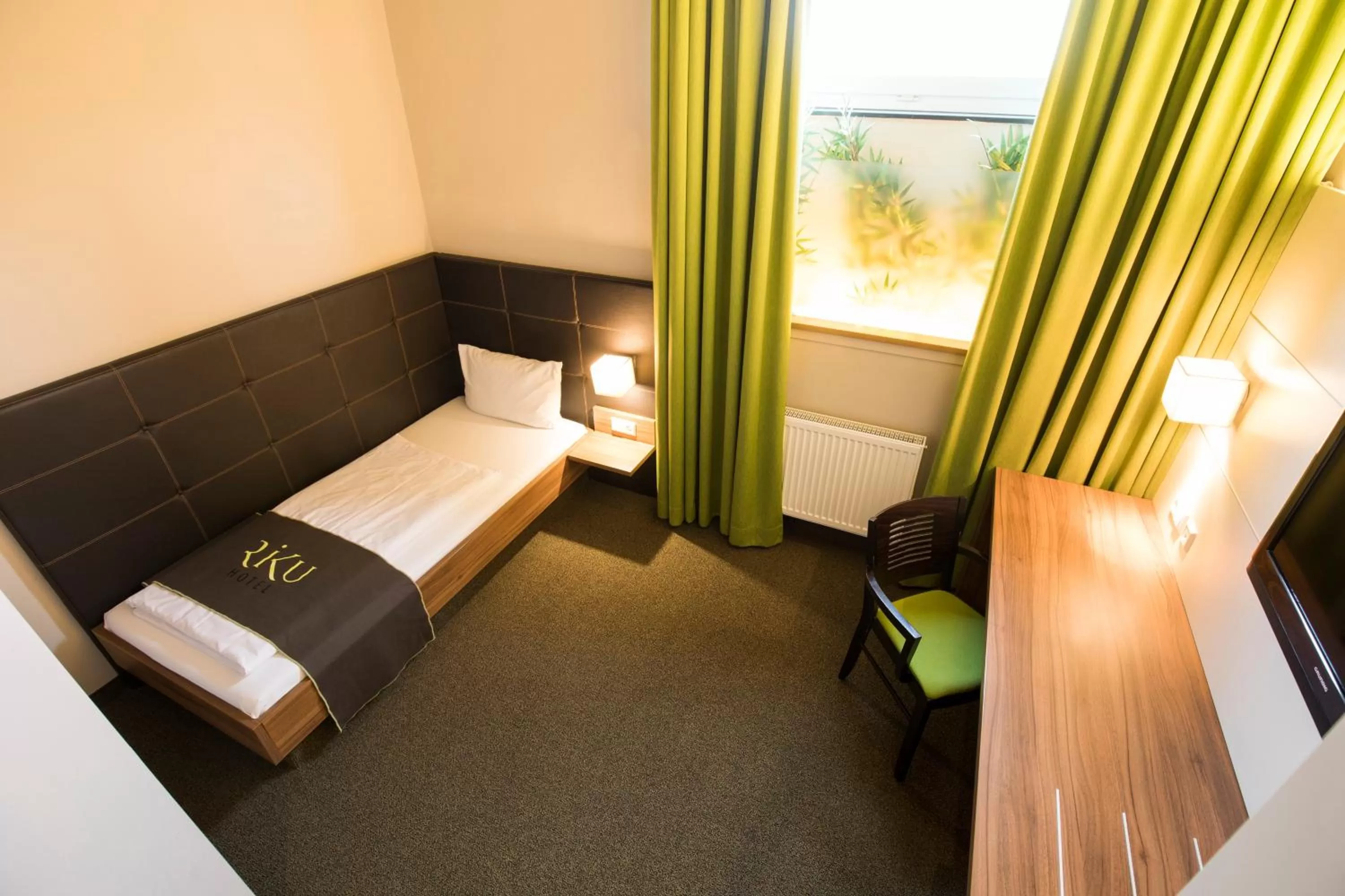 Photo of the whole room, Bed in RiKu HOTEL Neu-Ulm