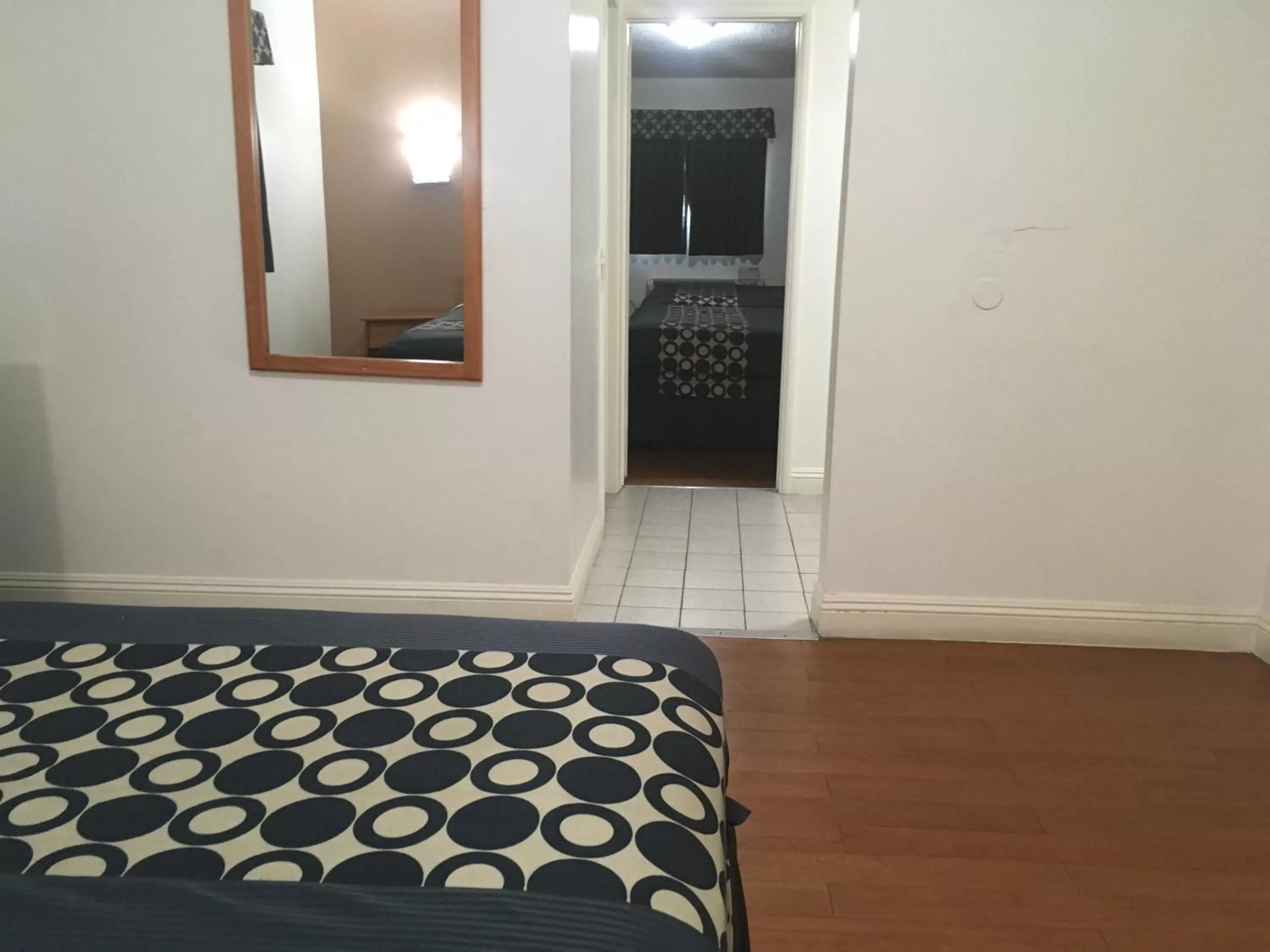 Bed in Americas Best Value Inn Beaumont California