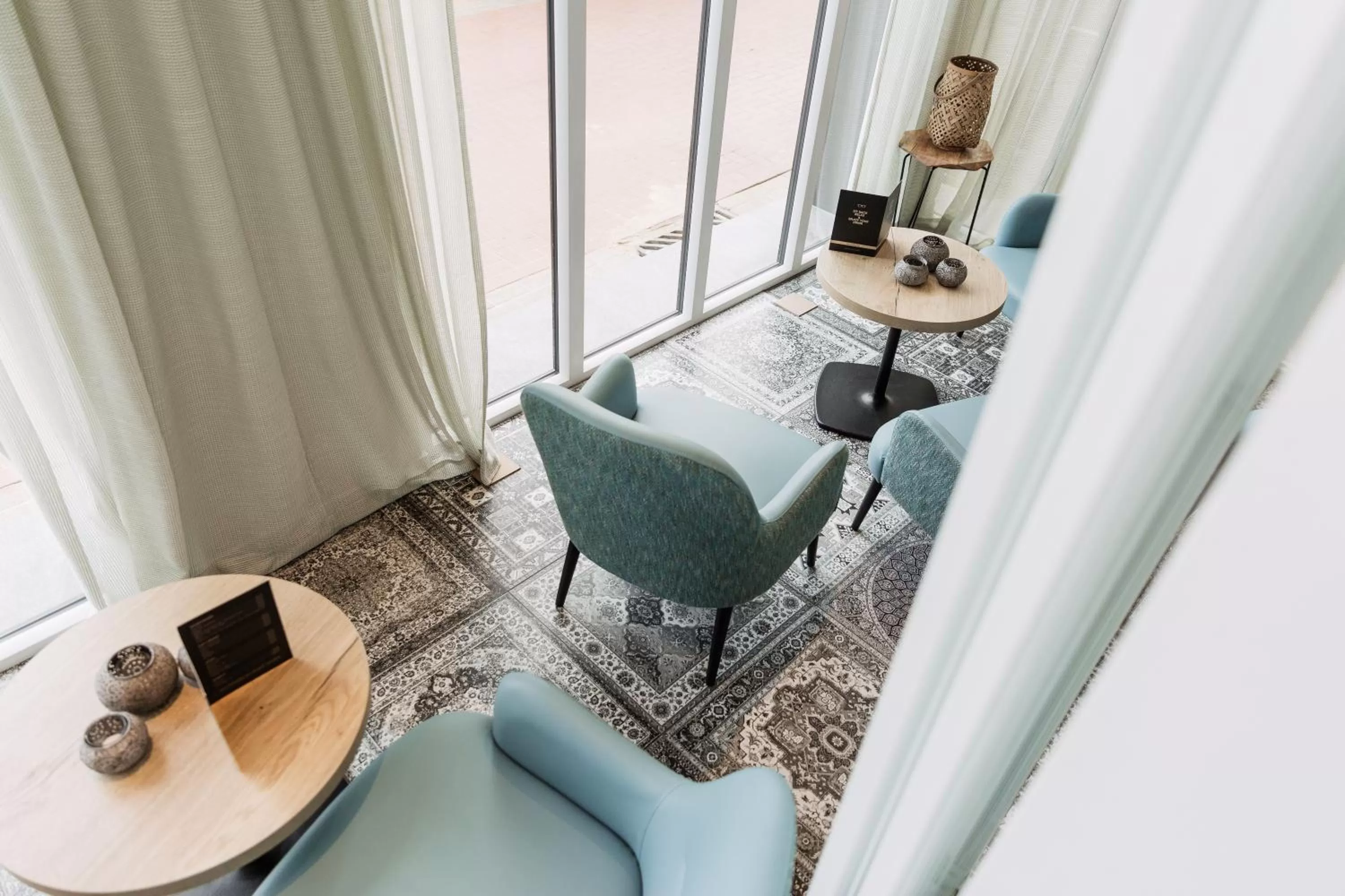 Living room in Beach Hotel Helios by CW Hotel Collection