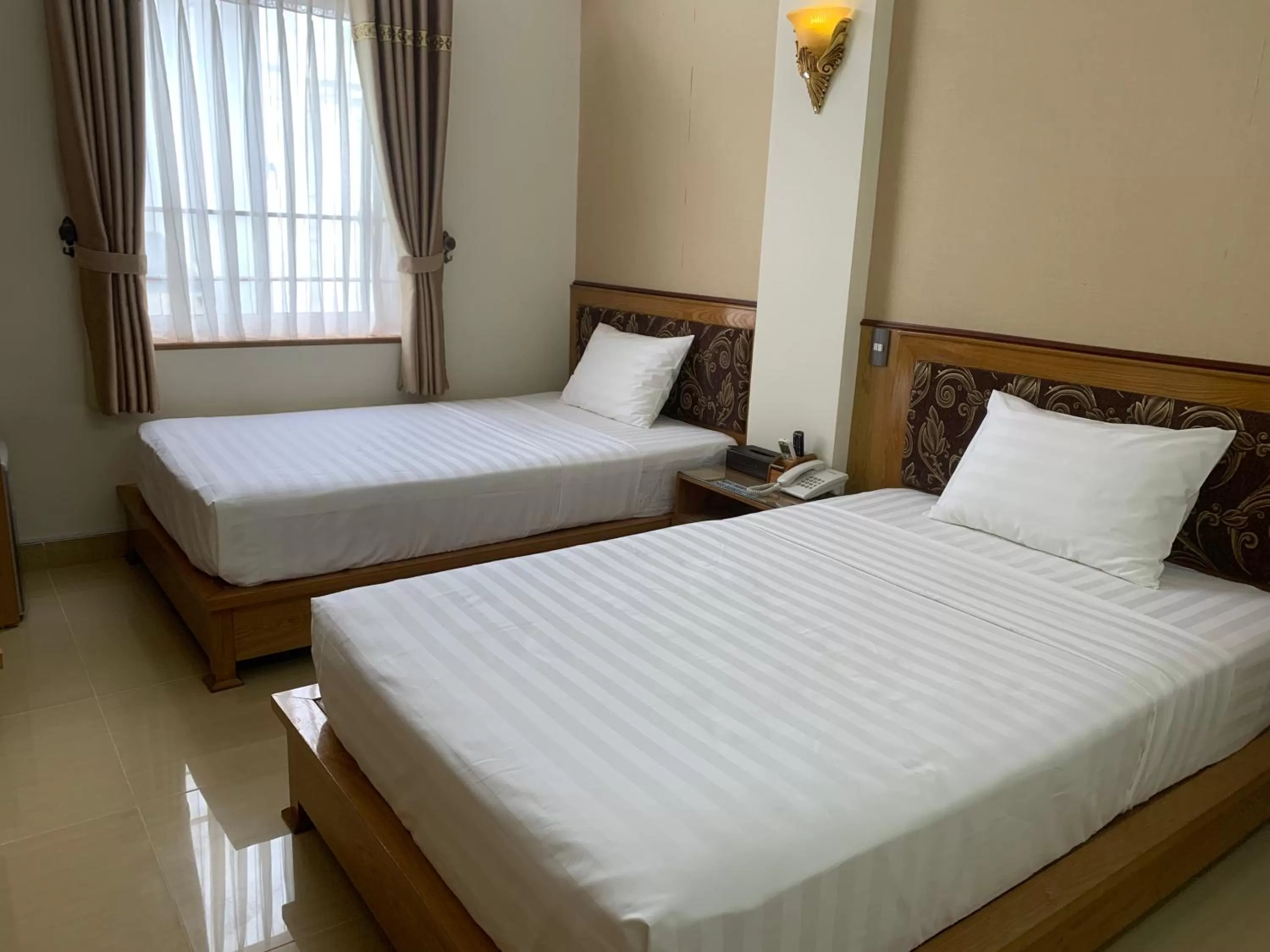 Bed in Hoa Phuong Hotel