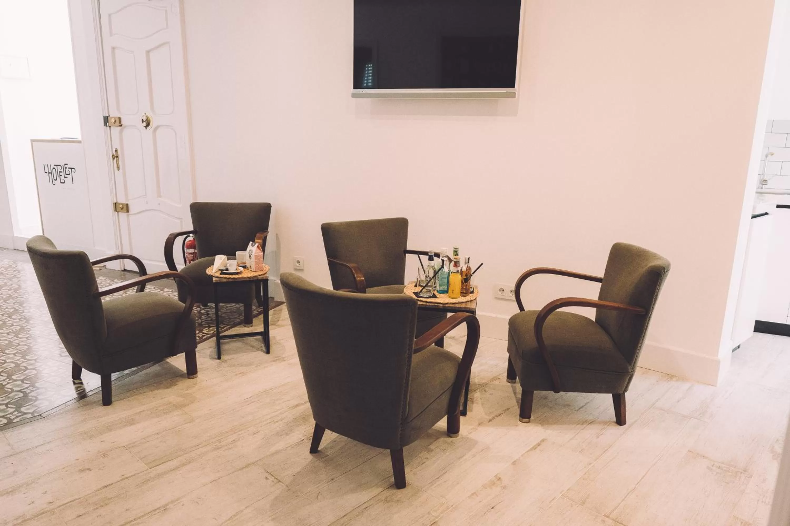 Communal lounge/ TV room, TV/Entertainment Center in Hotelet Casa Padró