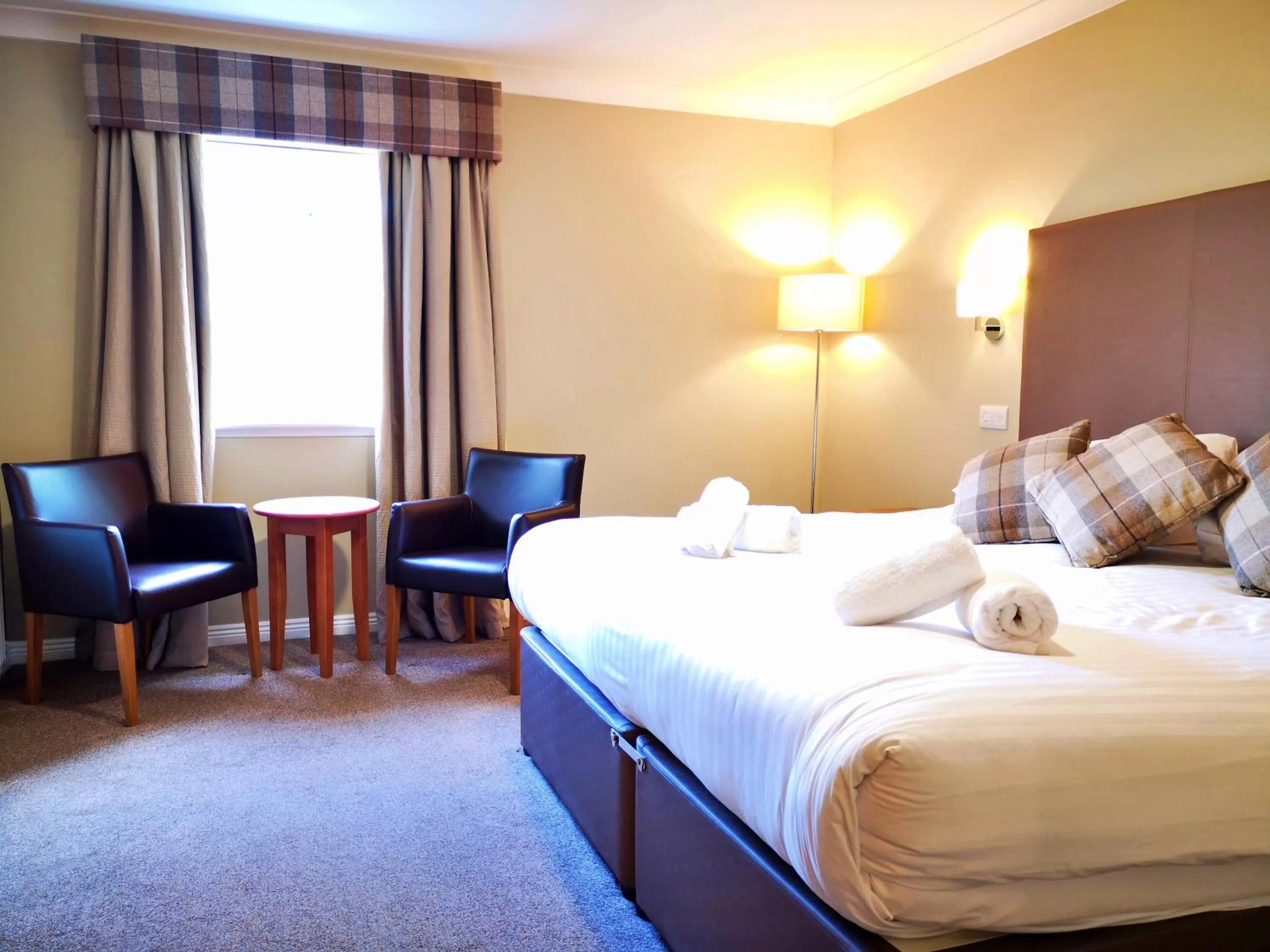 Bed in King Robert Hotel