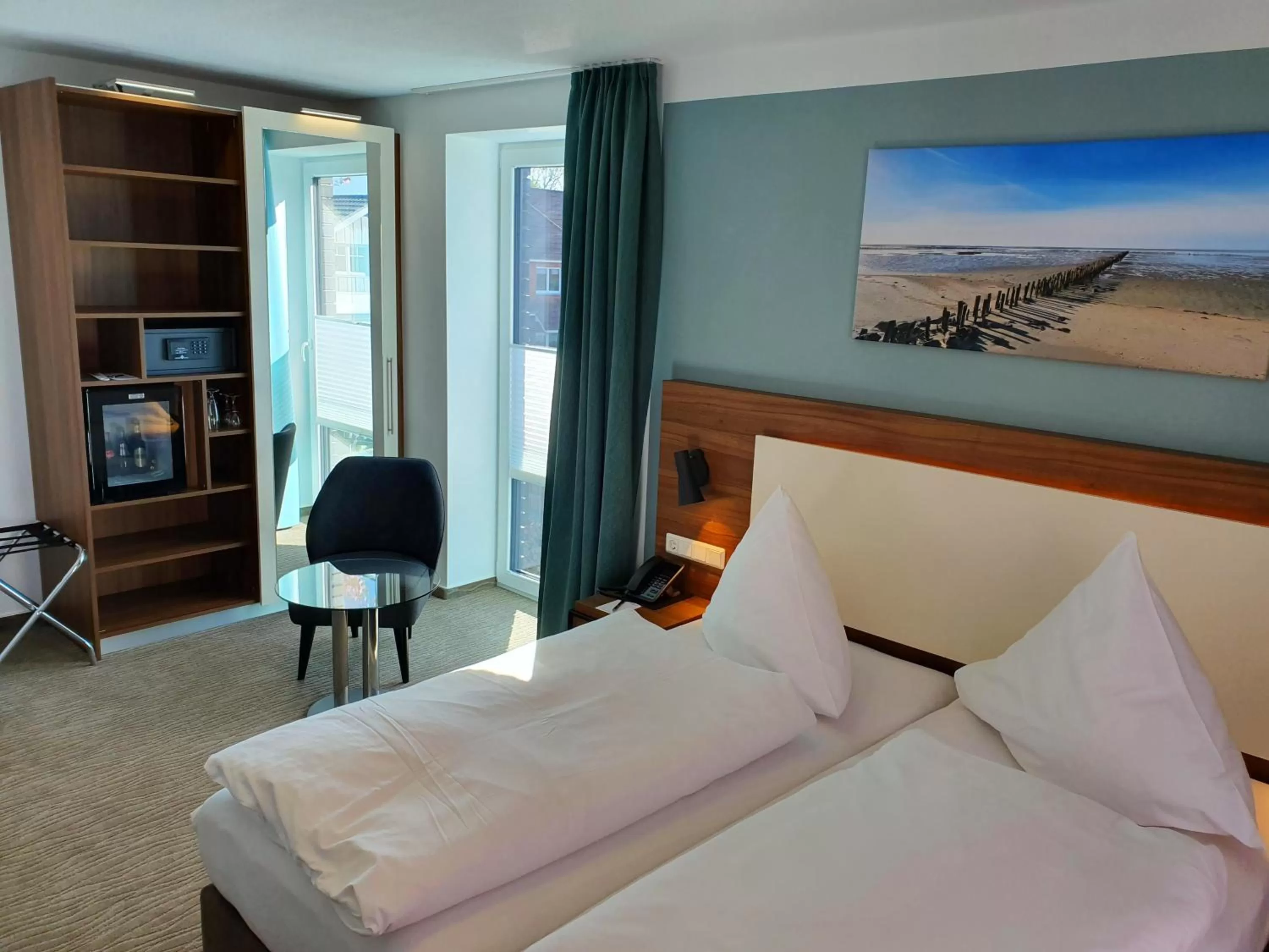 Photo of the whole room, Bed in Hotel Friesische Wehde