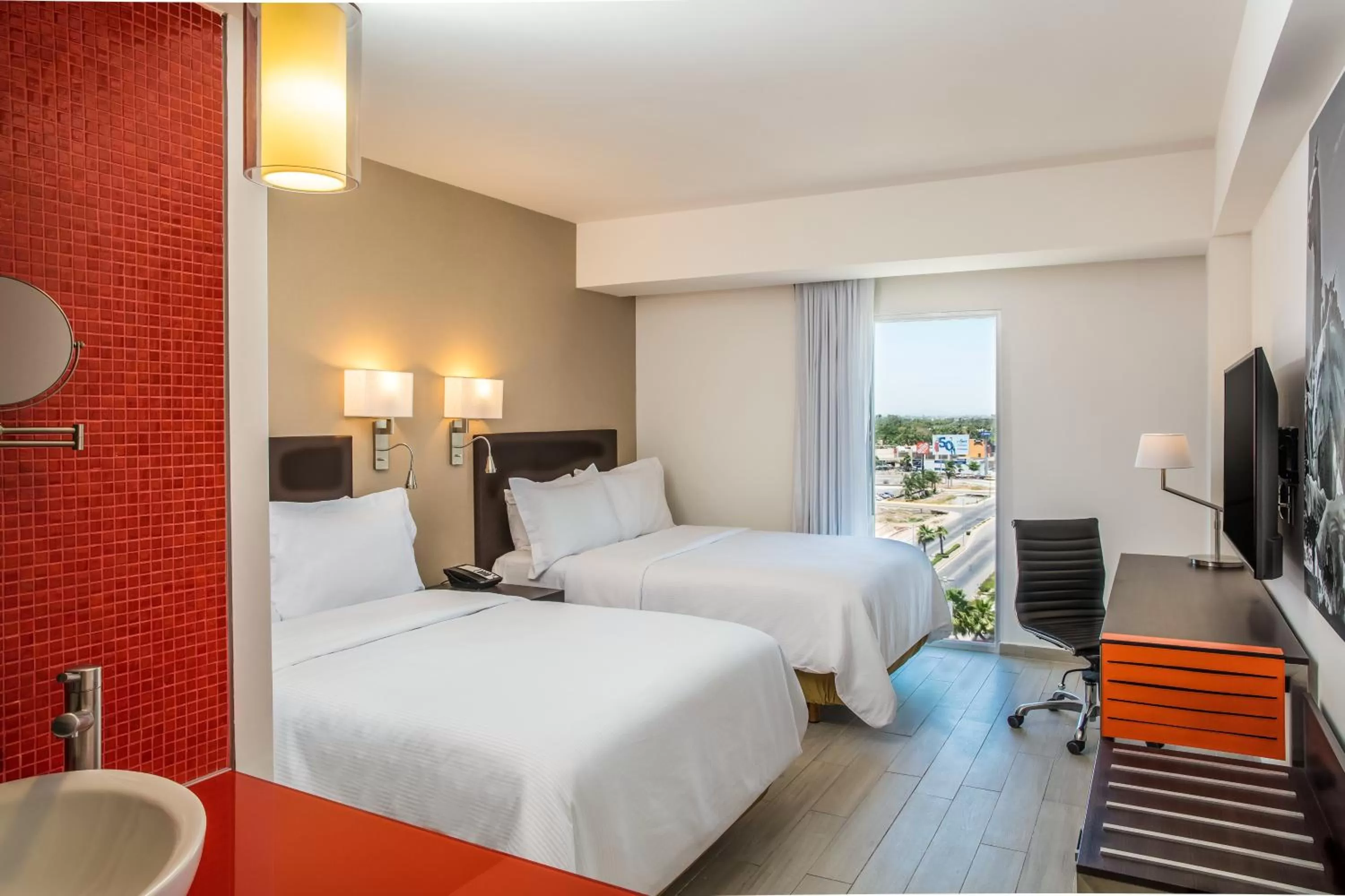 Photo of the whole room, Bed in Fiesta Inn Los Mochis