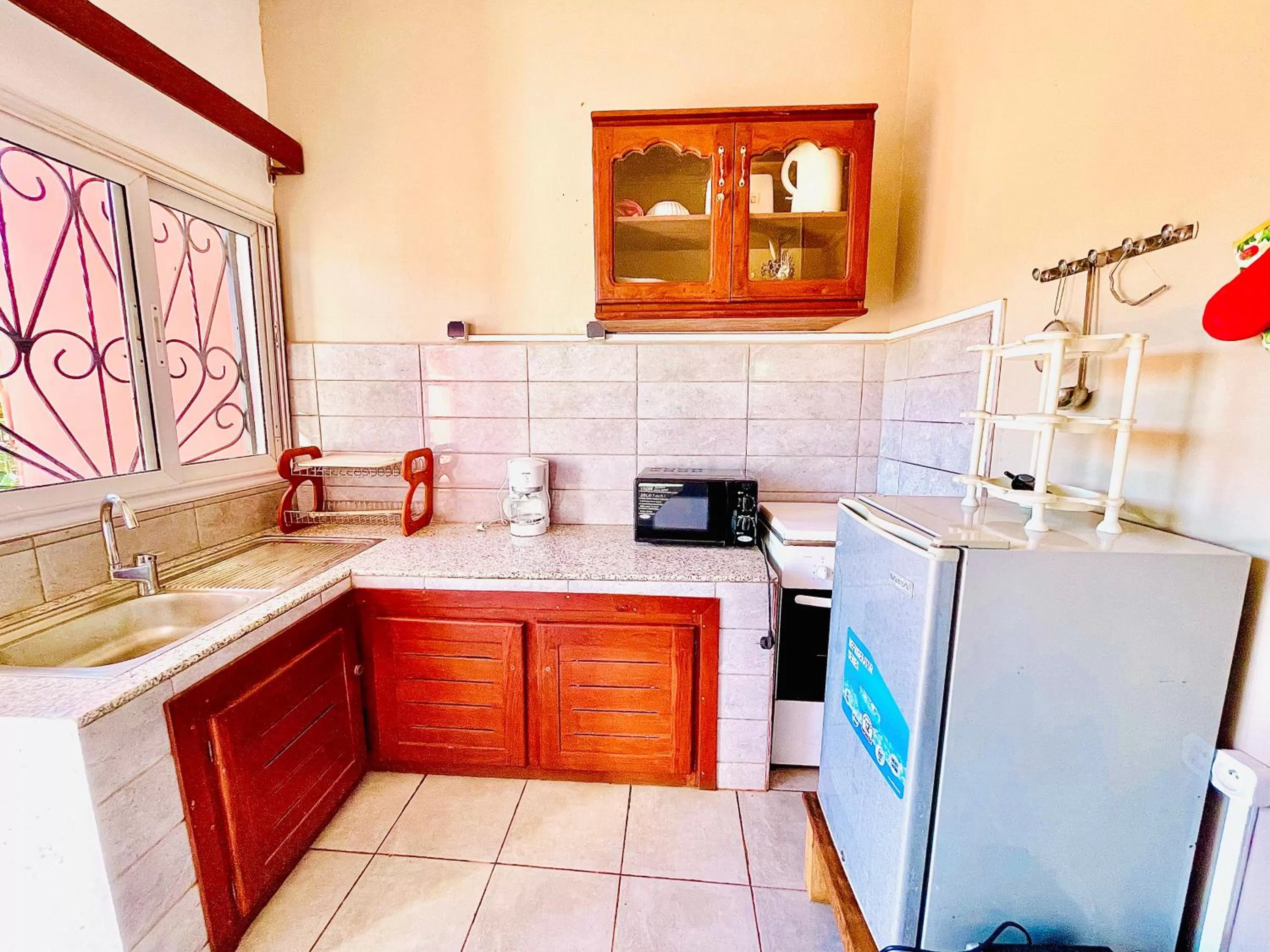 Kitchen or kitchenette in Régina Lodge Diégo Suarez Madagascar