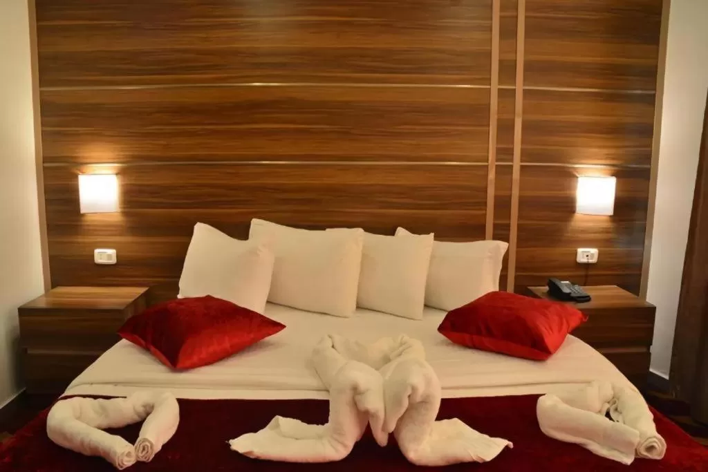 Bed in Spark Plaza Hotel