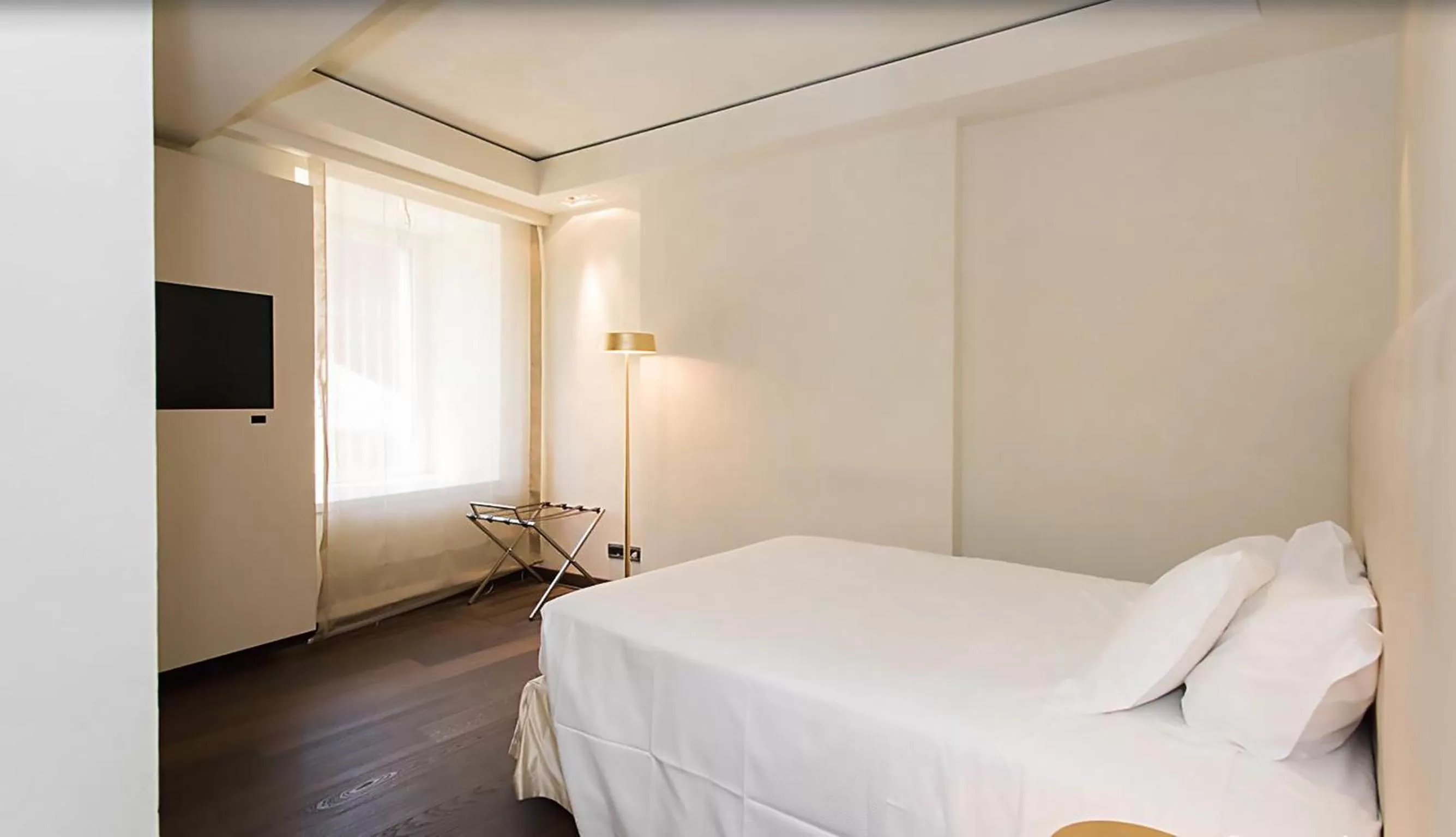 Bed in Hotel Romano House