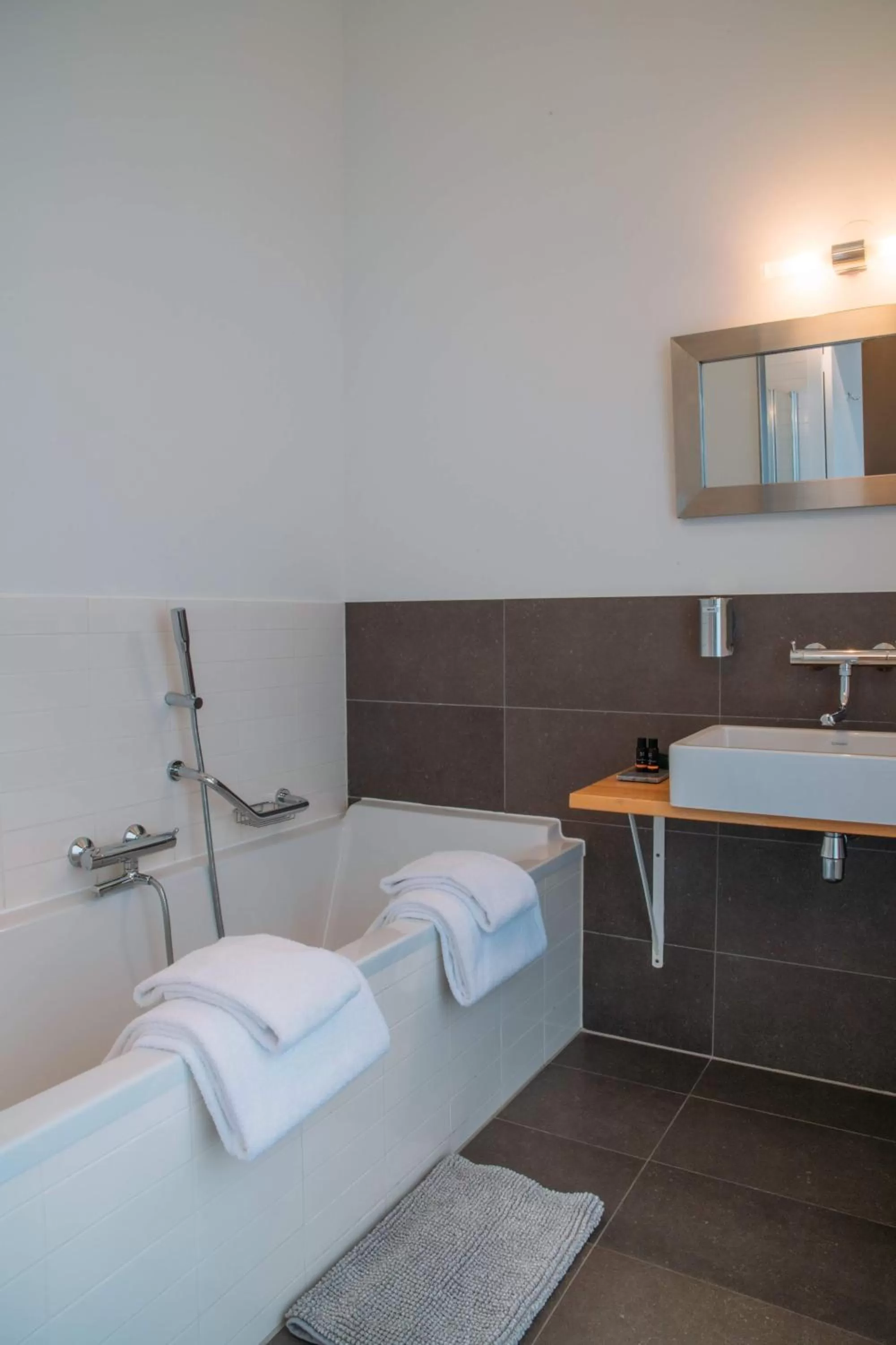 Bathroom, Bed in Hotel ML