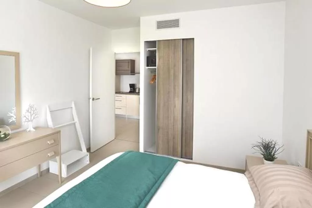 Bed in Domitys Le Jardin Des Palmiers