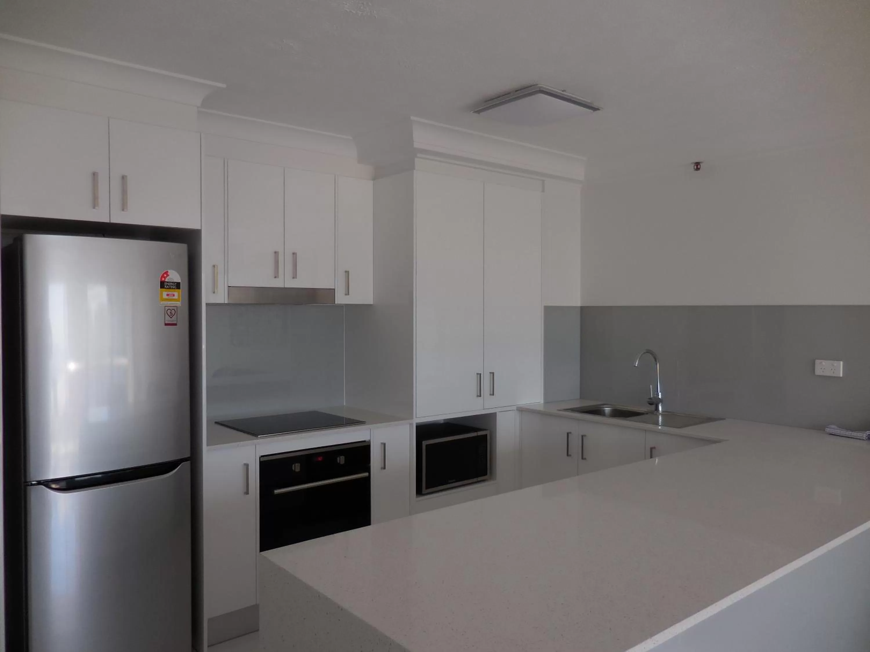 Living room in Surfers Century Oceanside Apartments