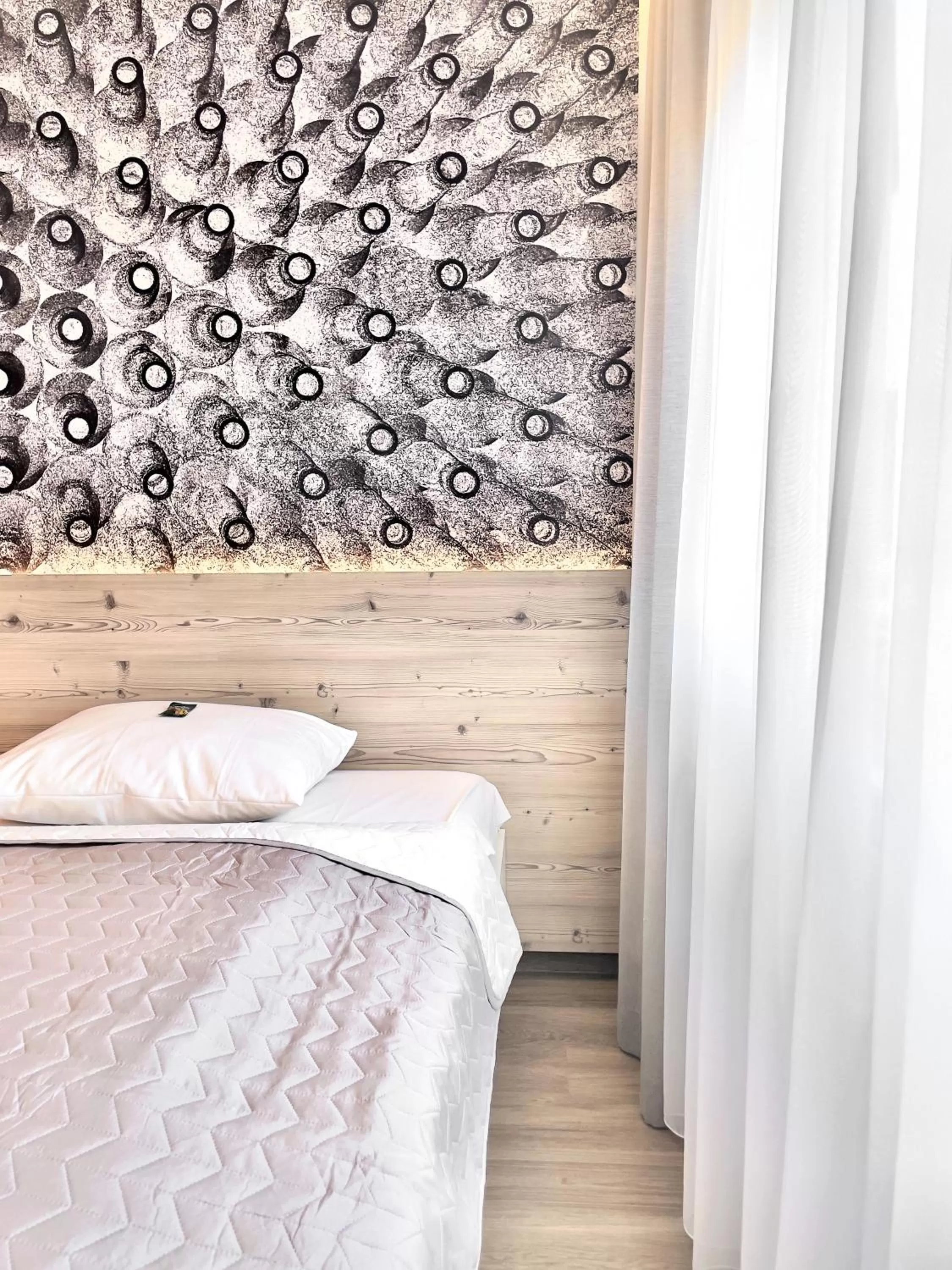 Bed in ART-Hotel Braun