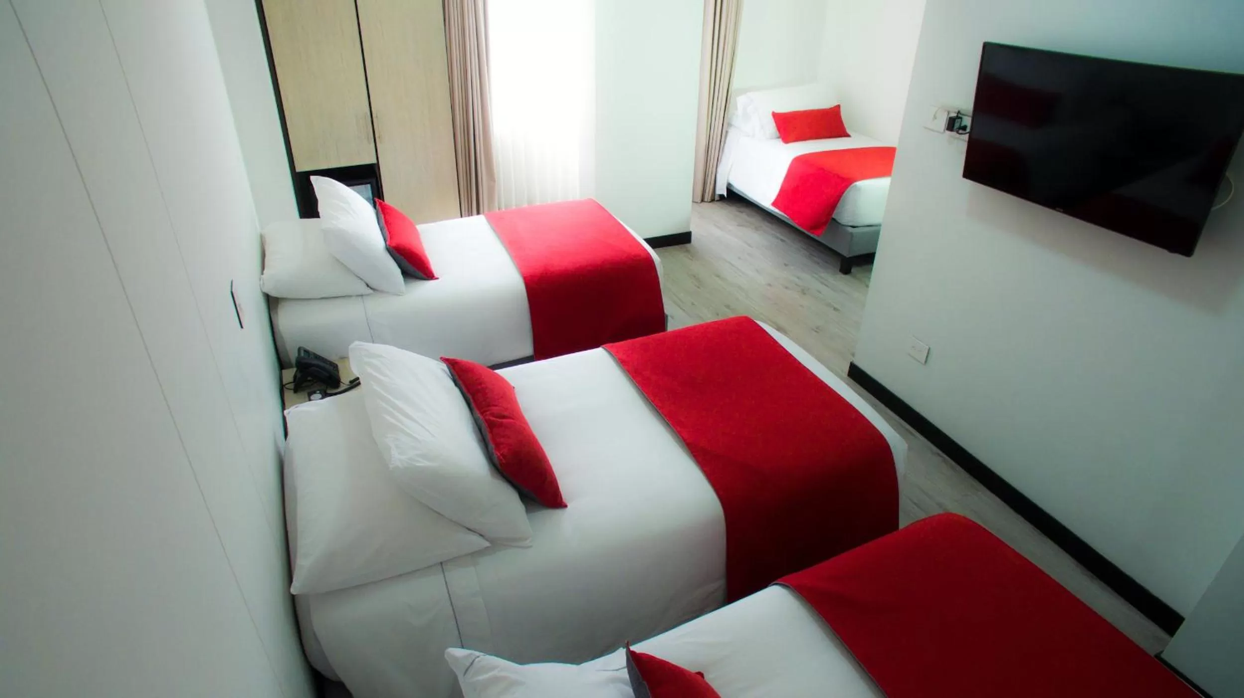 Bed in Hotel WLH Silver Bogota - White Lighthouse