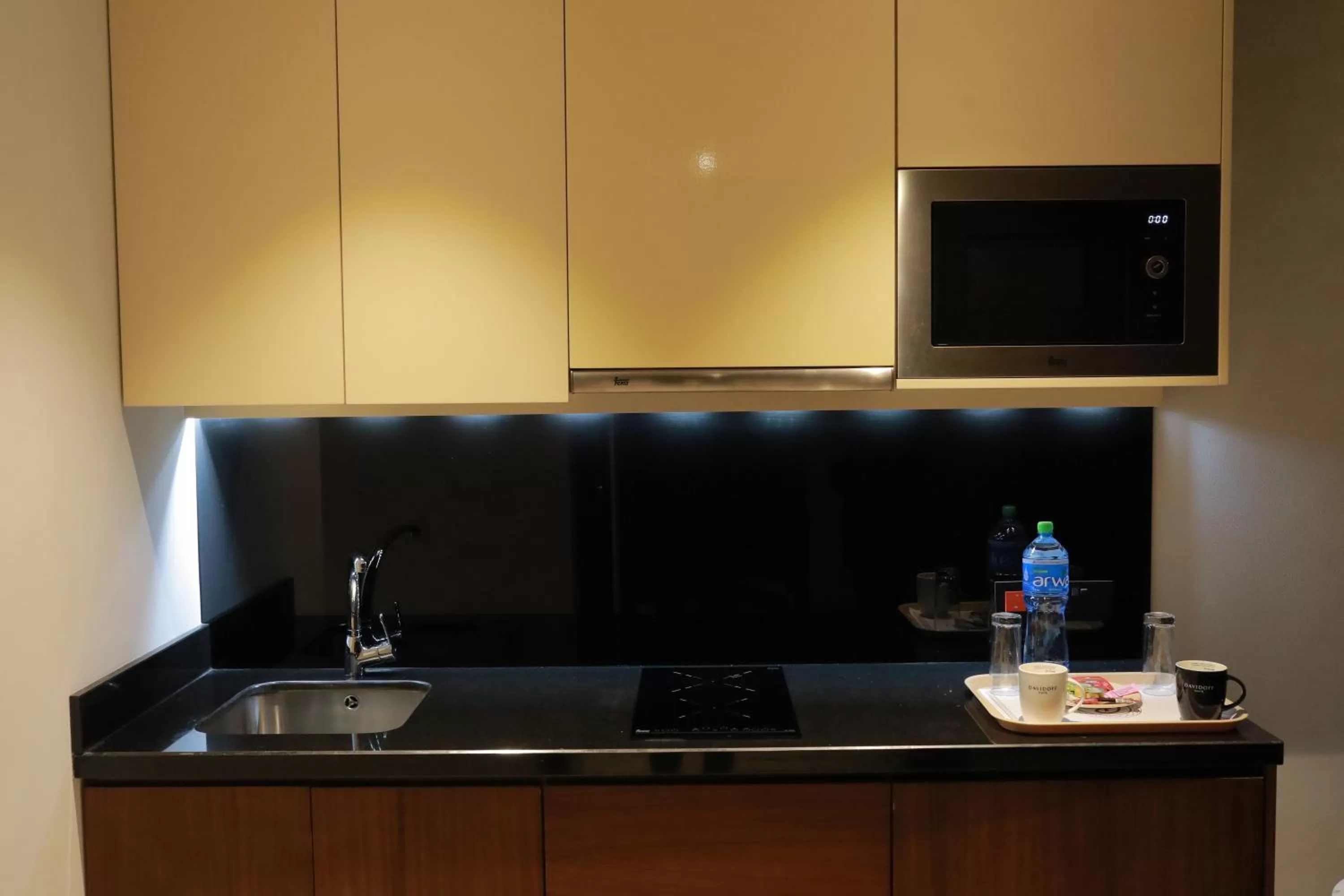 Kitchen or kitchenette in Ramee Palace Hotel