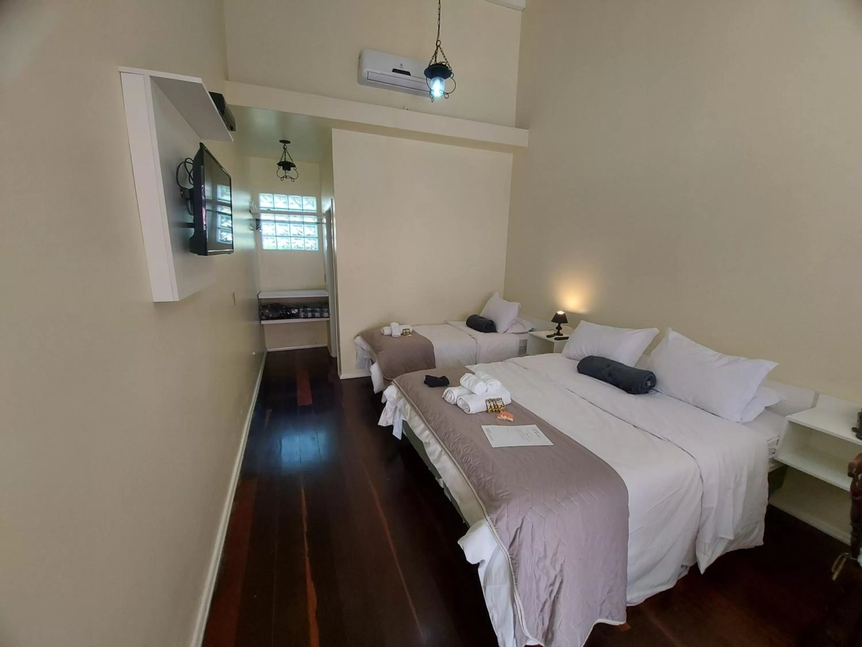 Bed in Pousada Lanai Canela