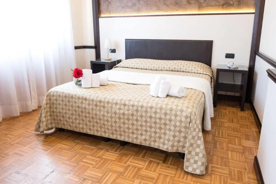 Bed in Hotel Astoria