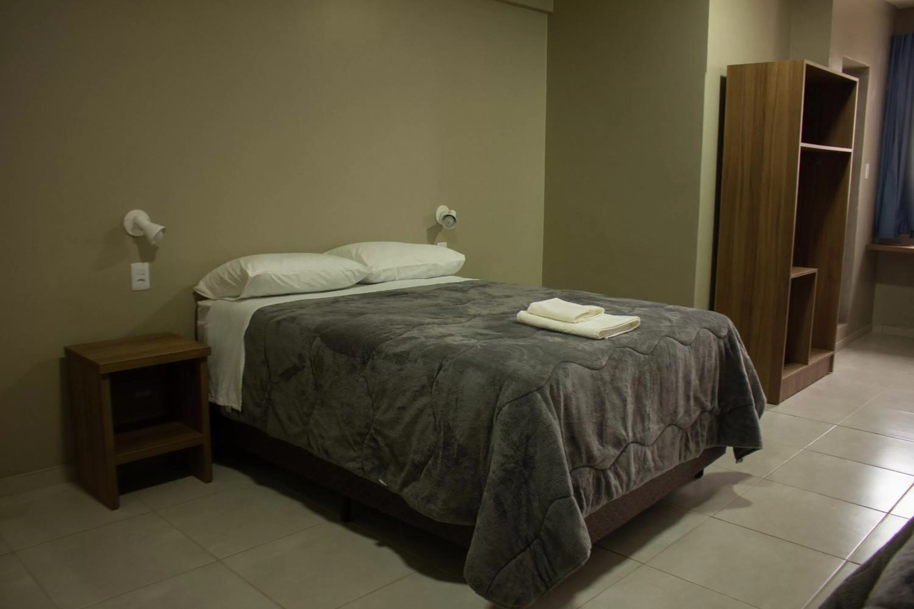 Bed in Hotel Executivo