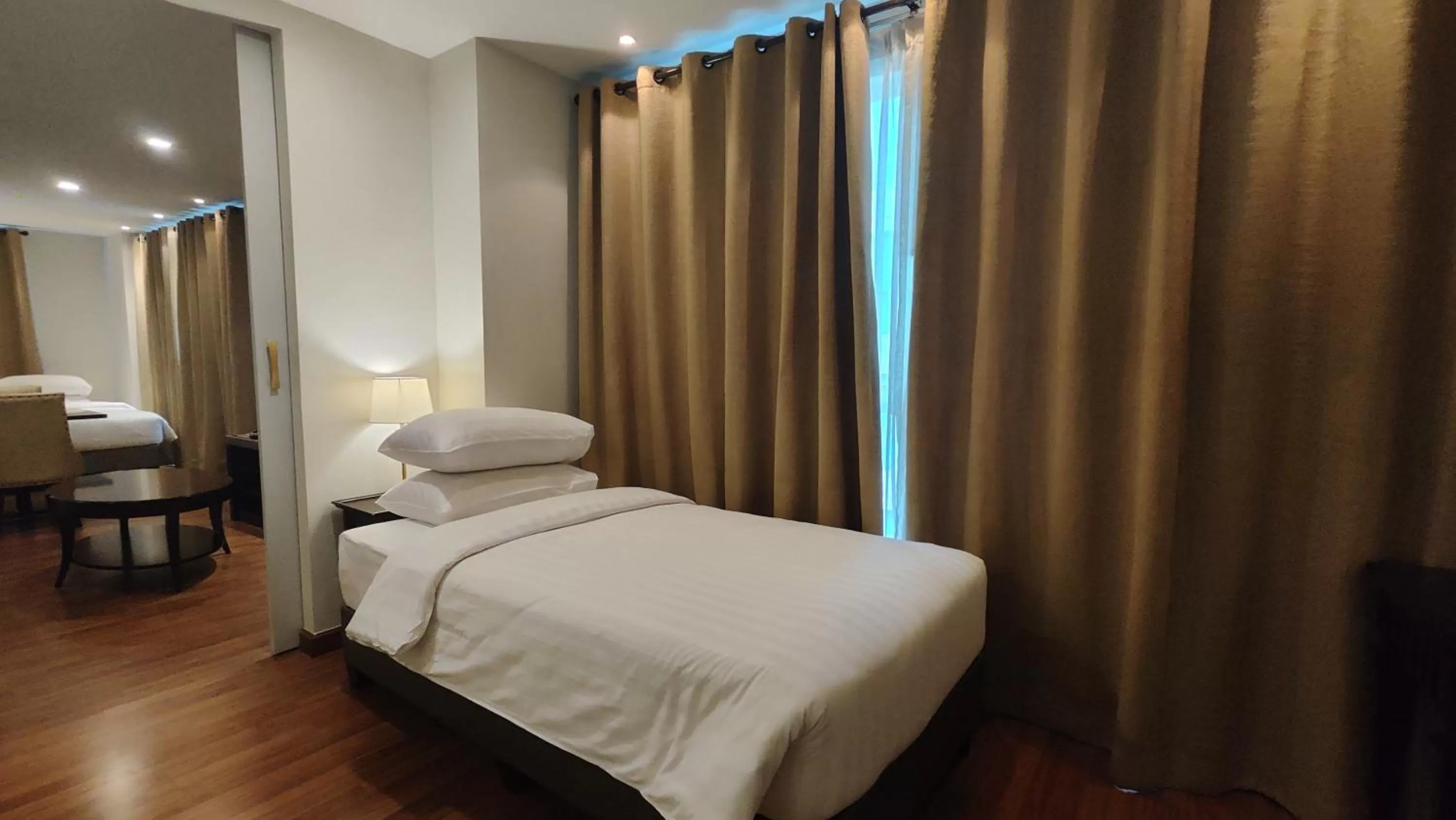 Bed in The Bless Hotel and Residence