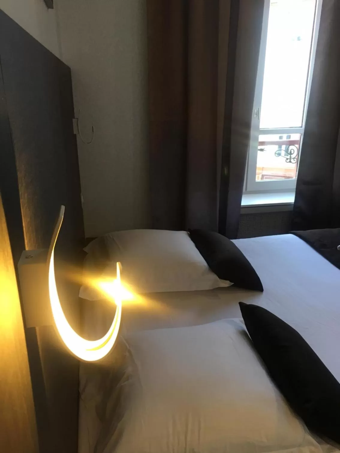 Photo of the whole room, Bed in Hôtel Le Biarritz - Vichy