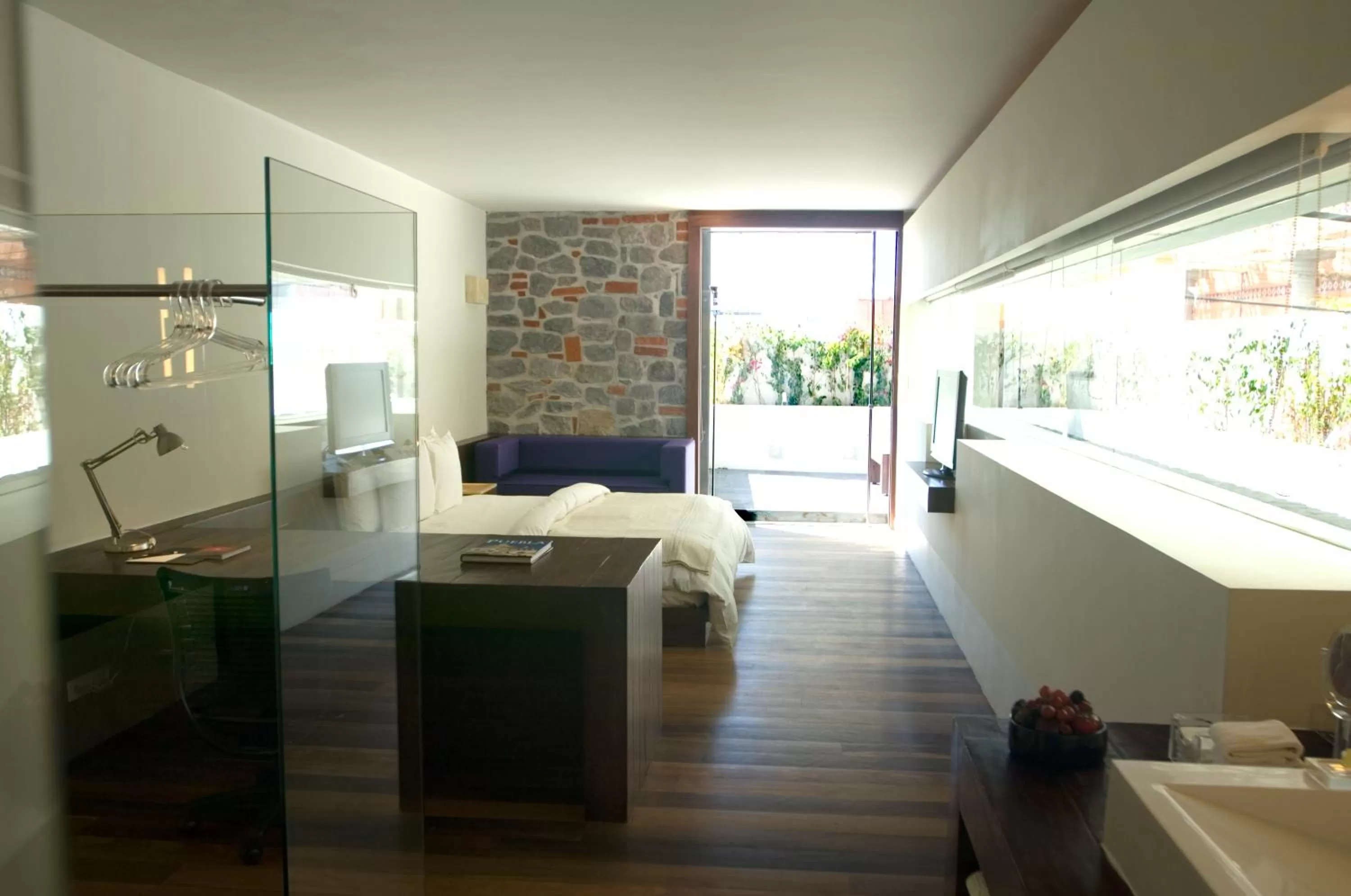Living room, Bed in La Purificadora, Puebla, a Member of Design Hotels