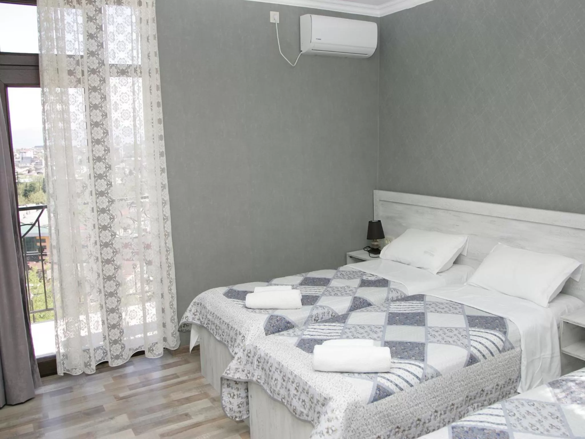 Balcony/Terrace, Bed in Hotel Tskhumi