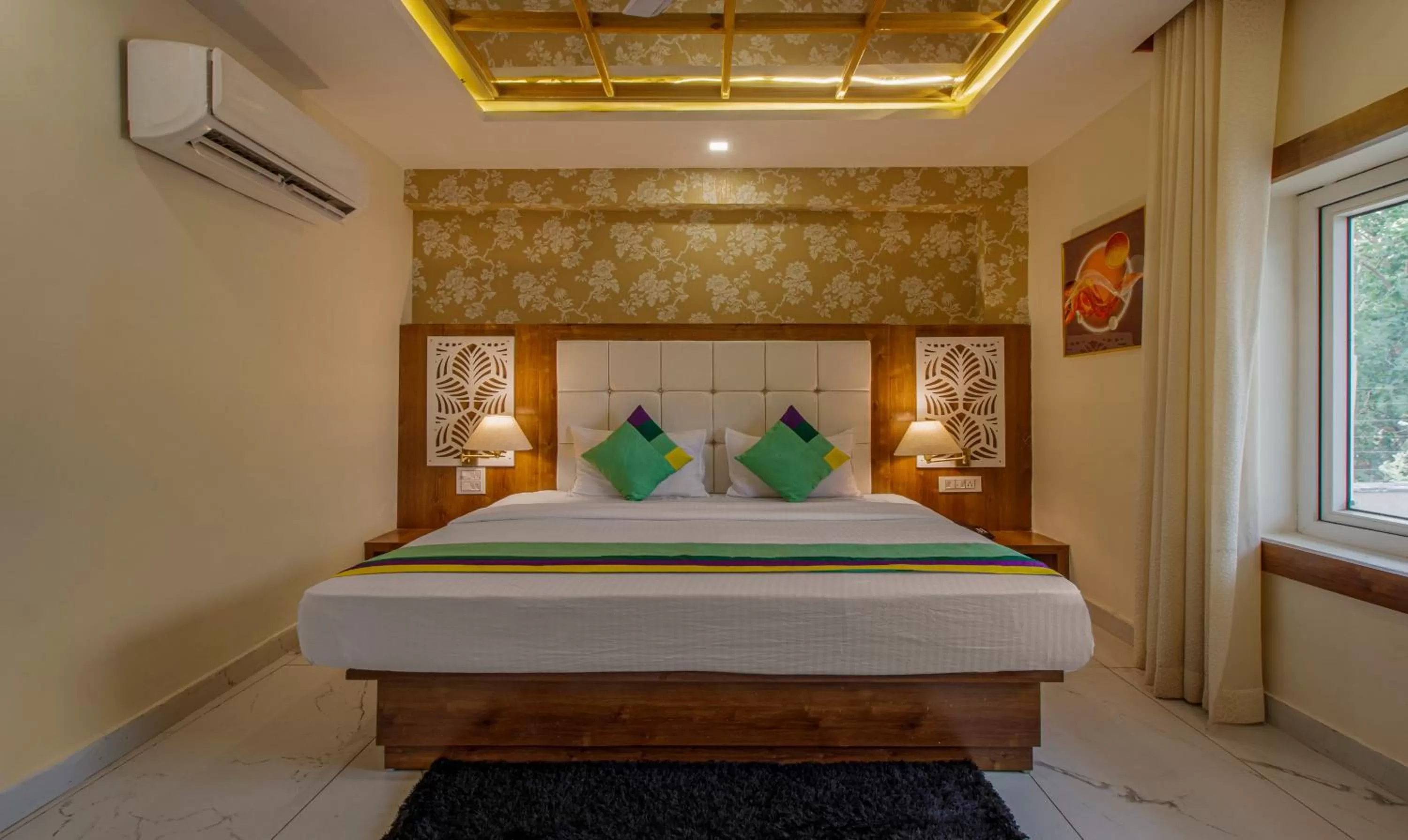 Bed in Treebo Trend Haveli Resort Roots Bhupatwala