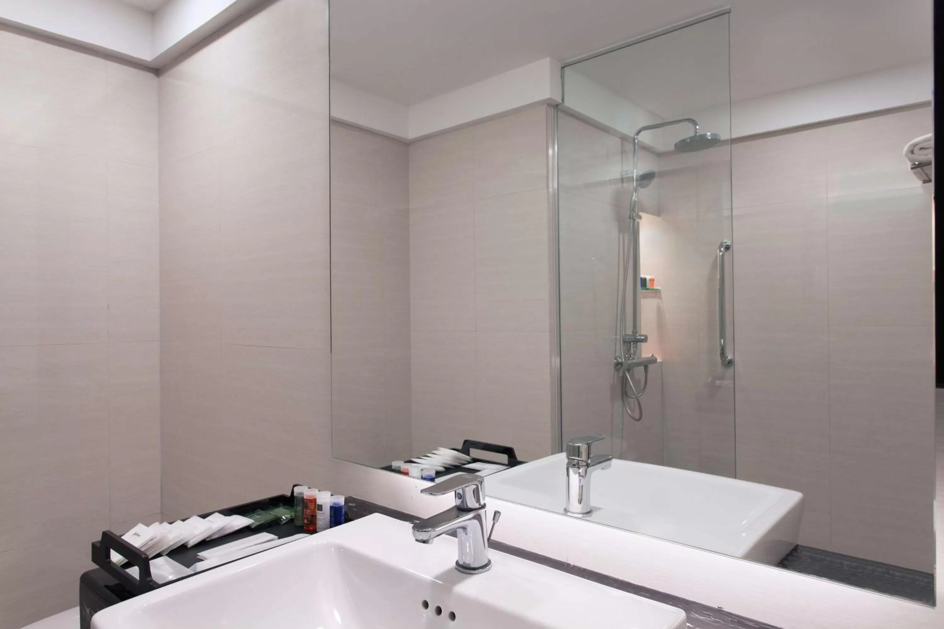 Bathroom in AIHO Hotel Medan