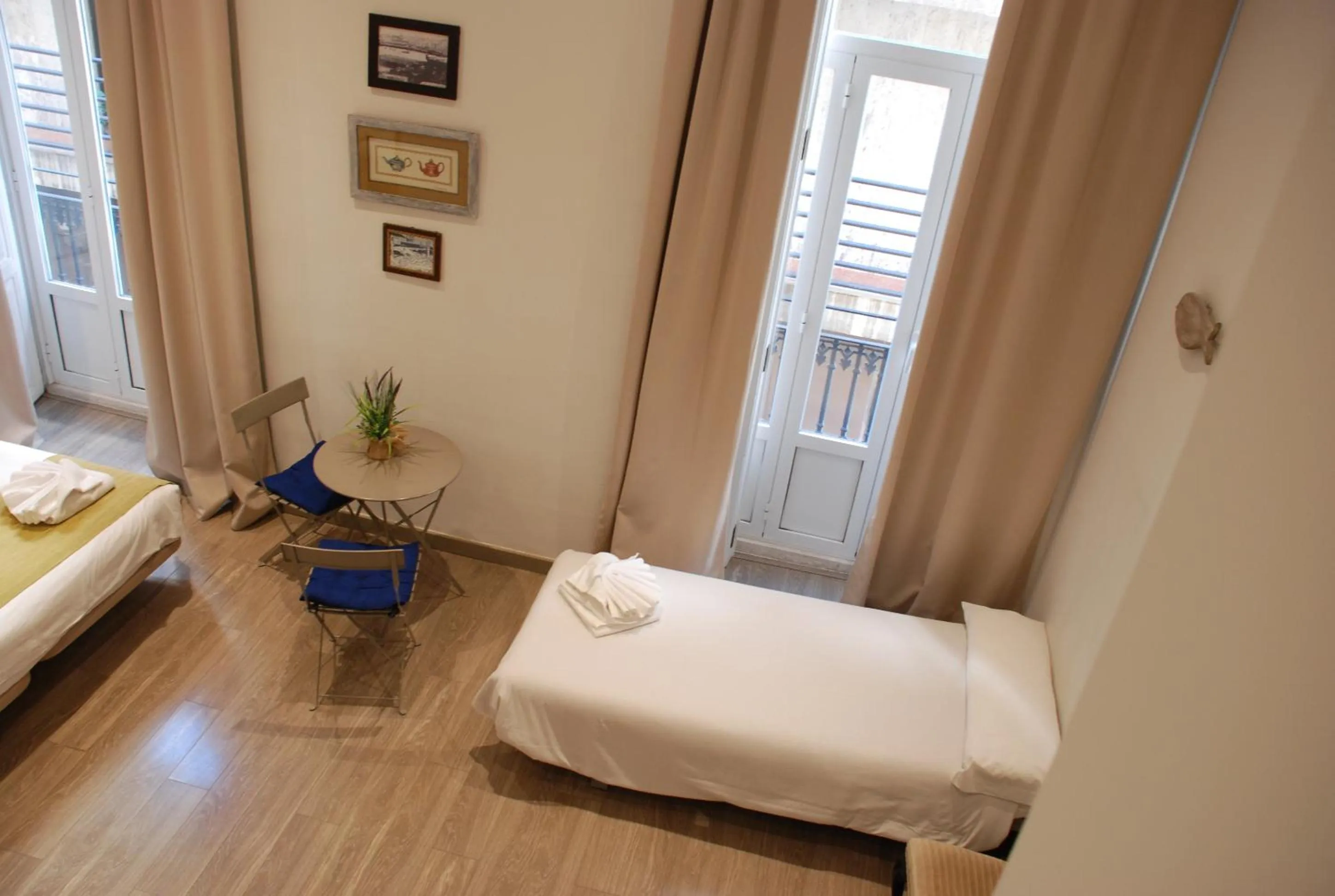 Bed in Hotel San Lorenzo Boutique Plaza