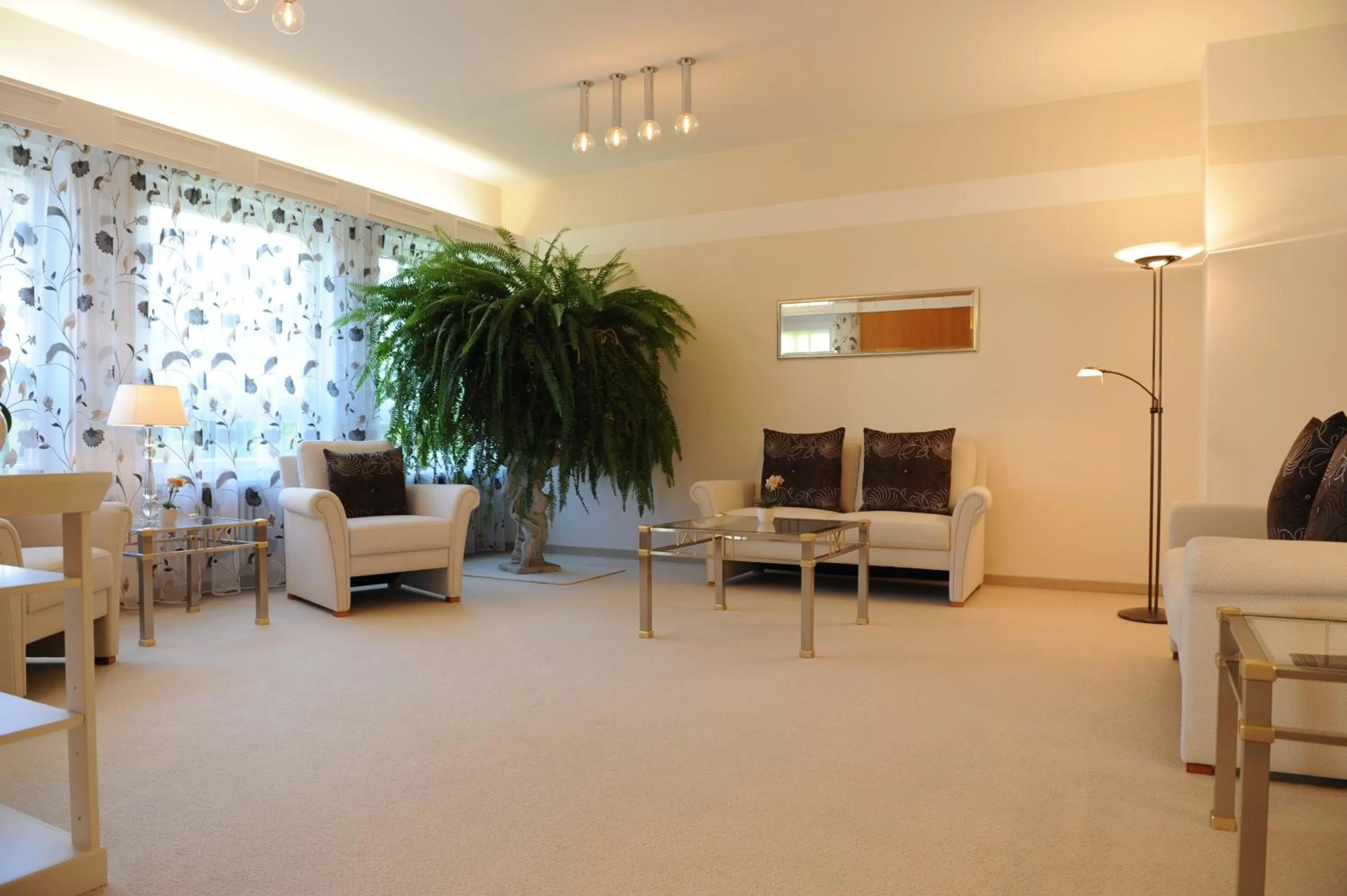 Communal lounge/ TV room in Hotel Christine