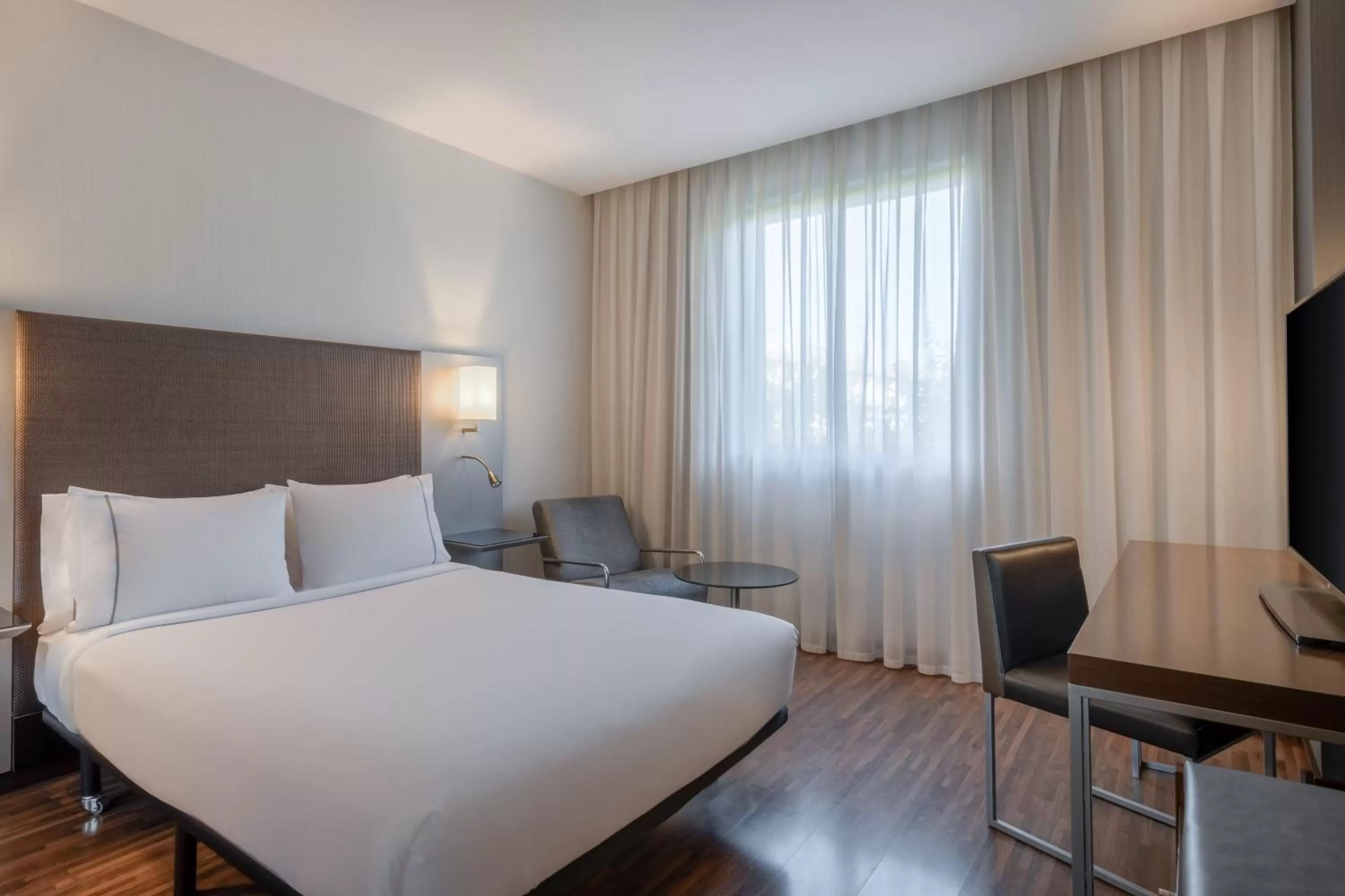 Photo of the whole room, Bed in AC Hotel by Marriott Madrid Airport