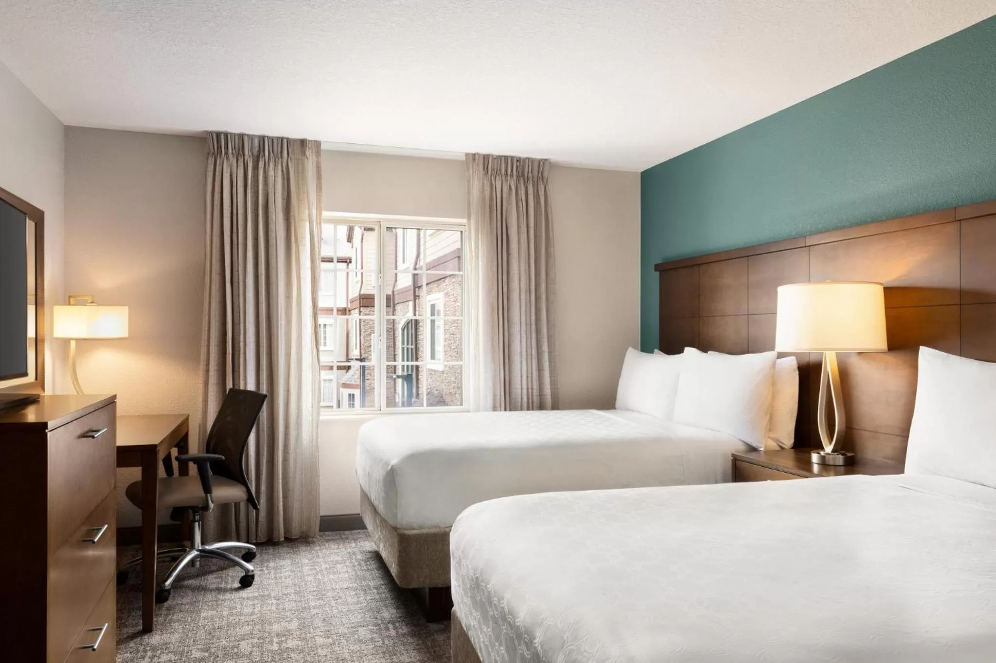 Photo of the whole room, Bed in Staybridge Suites Fort Wayne by IHG