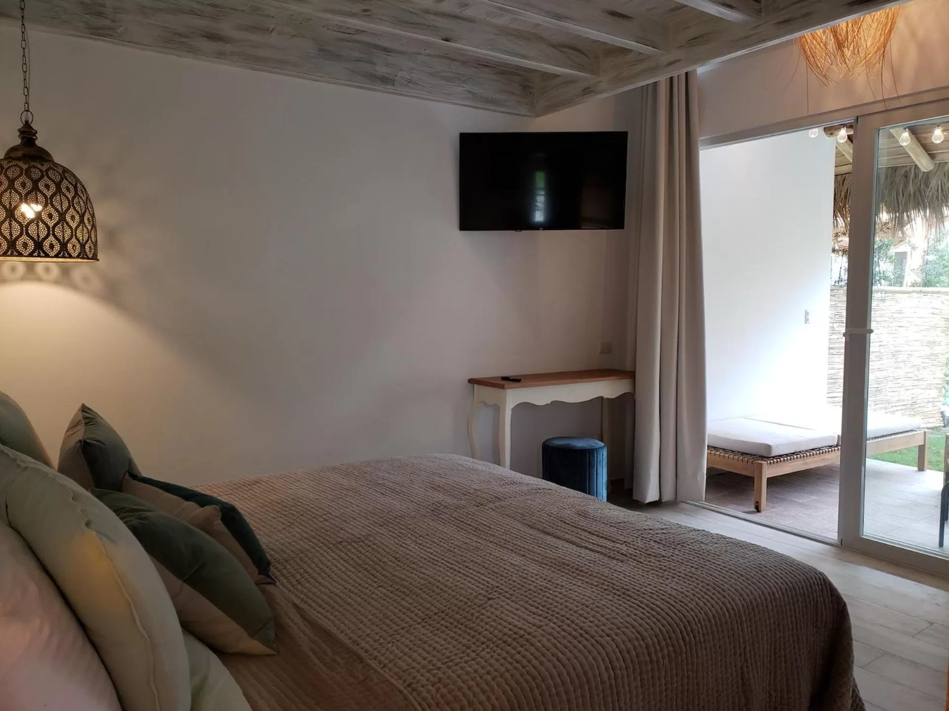 Bed in TAKUMA BOUTIK HOTEL