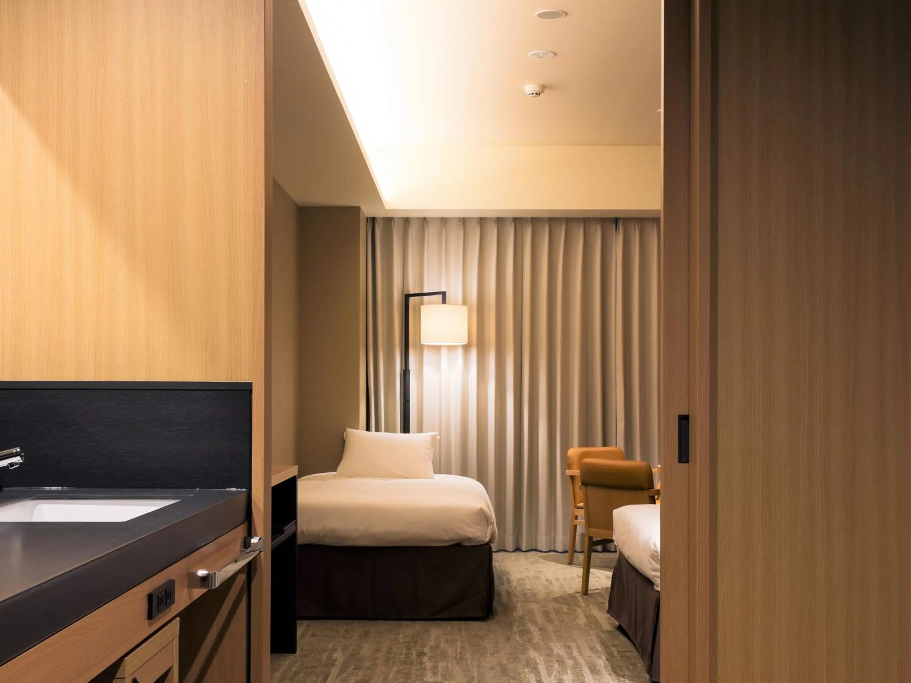 Photo of the whole room, Bed in Hakodate Yunokawa Onsen Umi to Akari Hewitt Resort